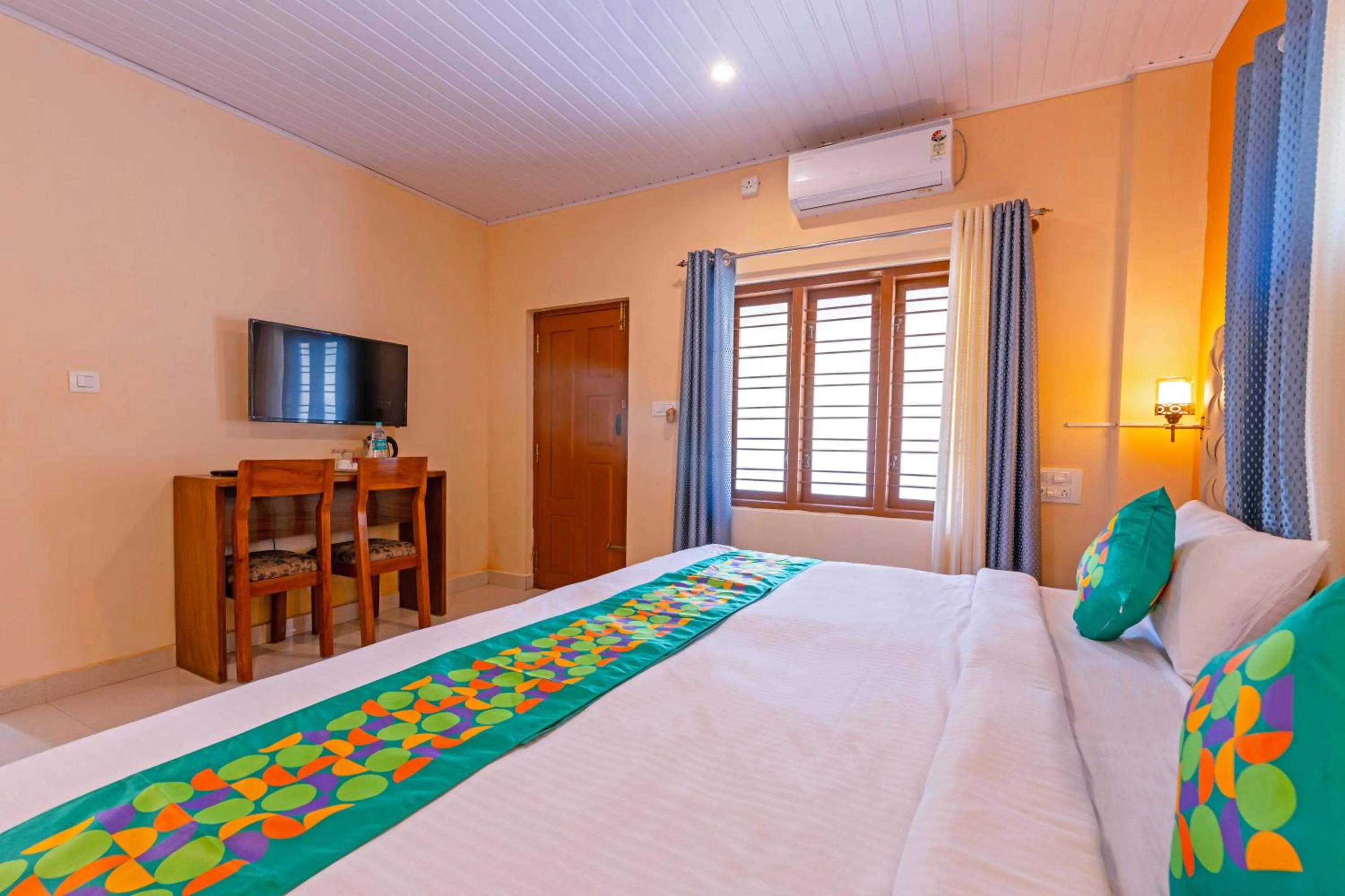 Bedroom in Treebo River View