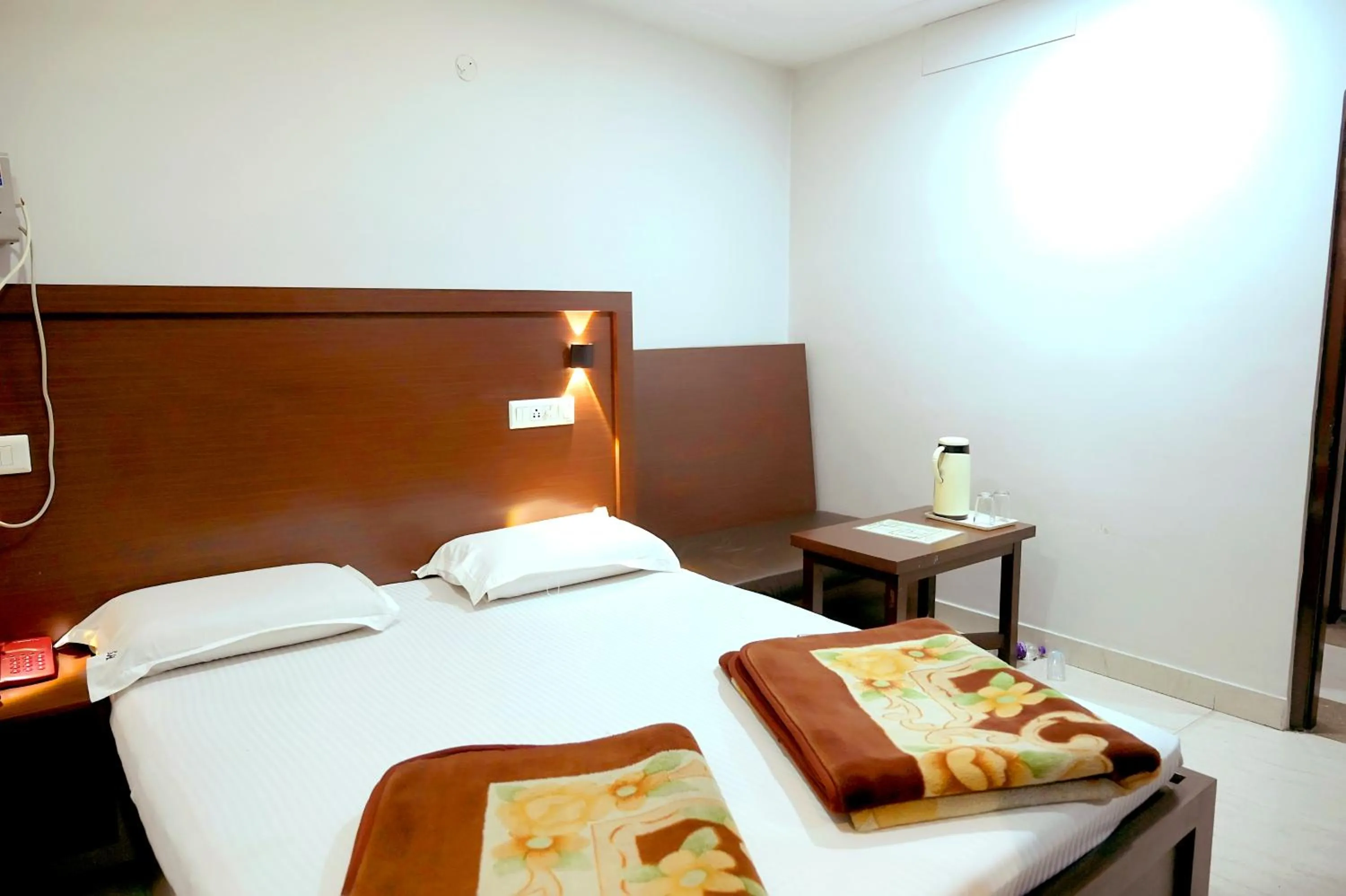 Bed in Subhash Hotel