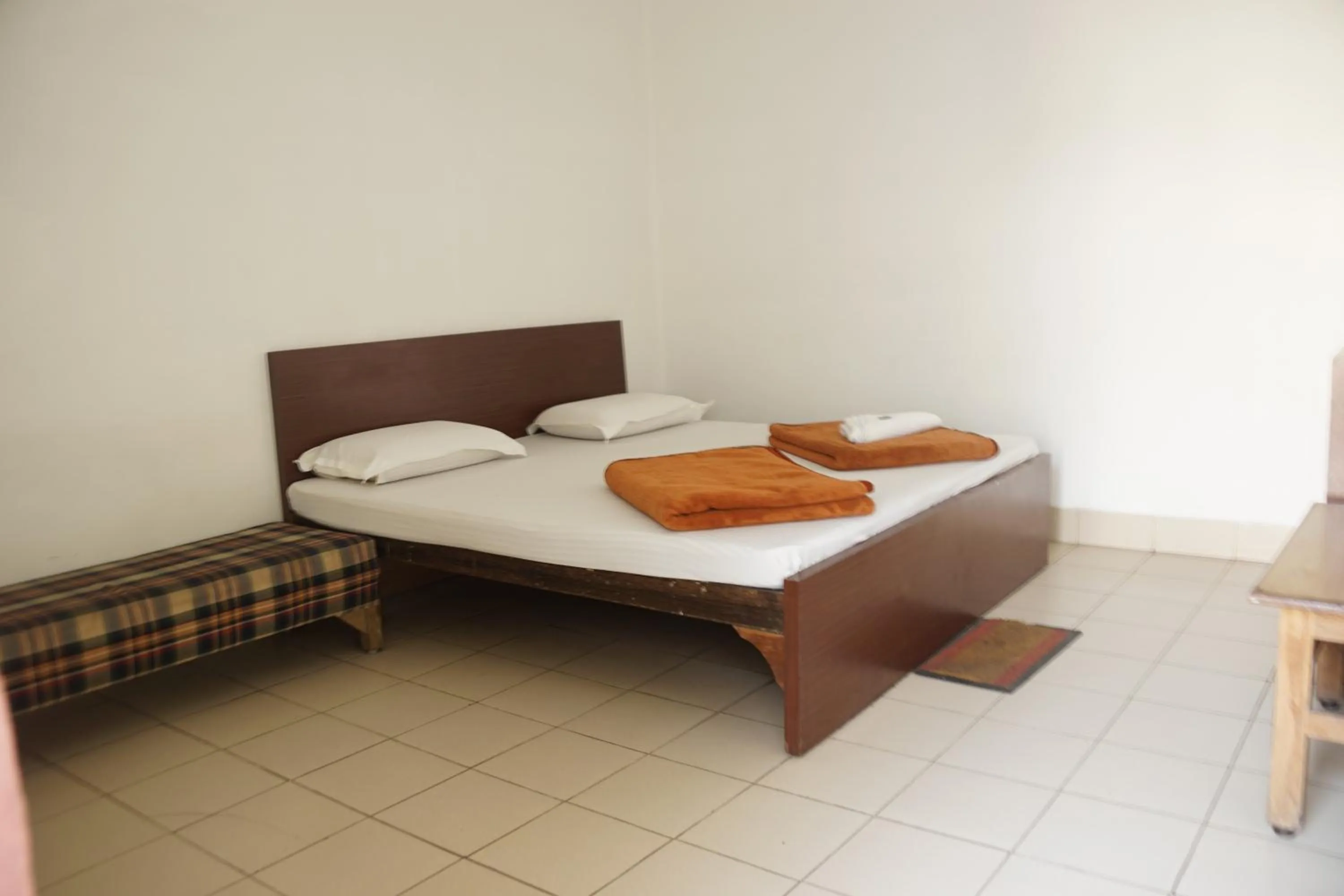 Bed in Subhash Hotel