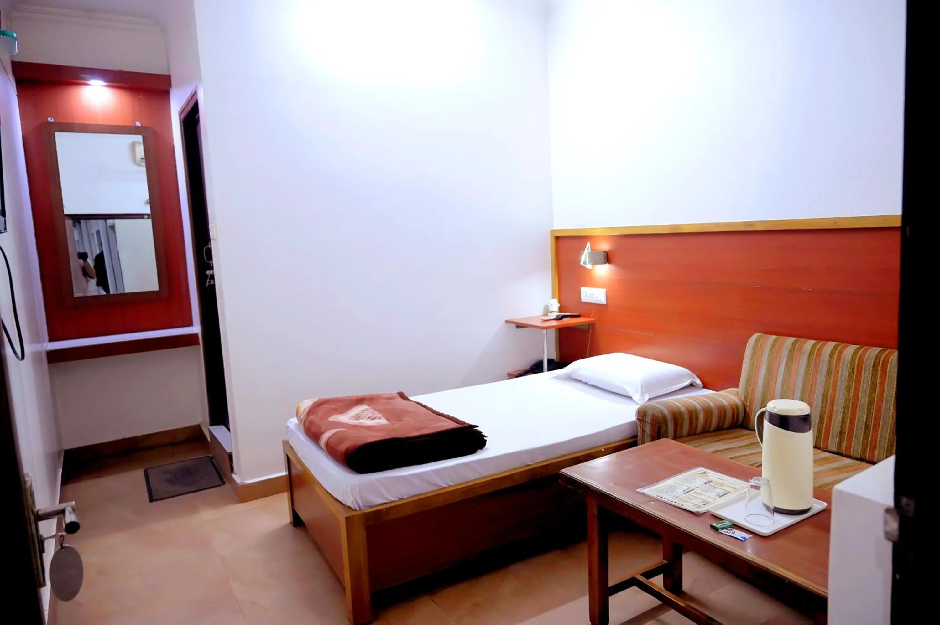 Bed in Subhash Hotel