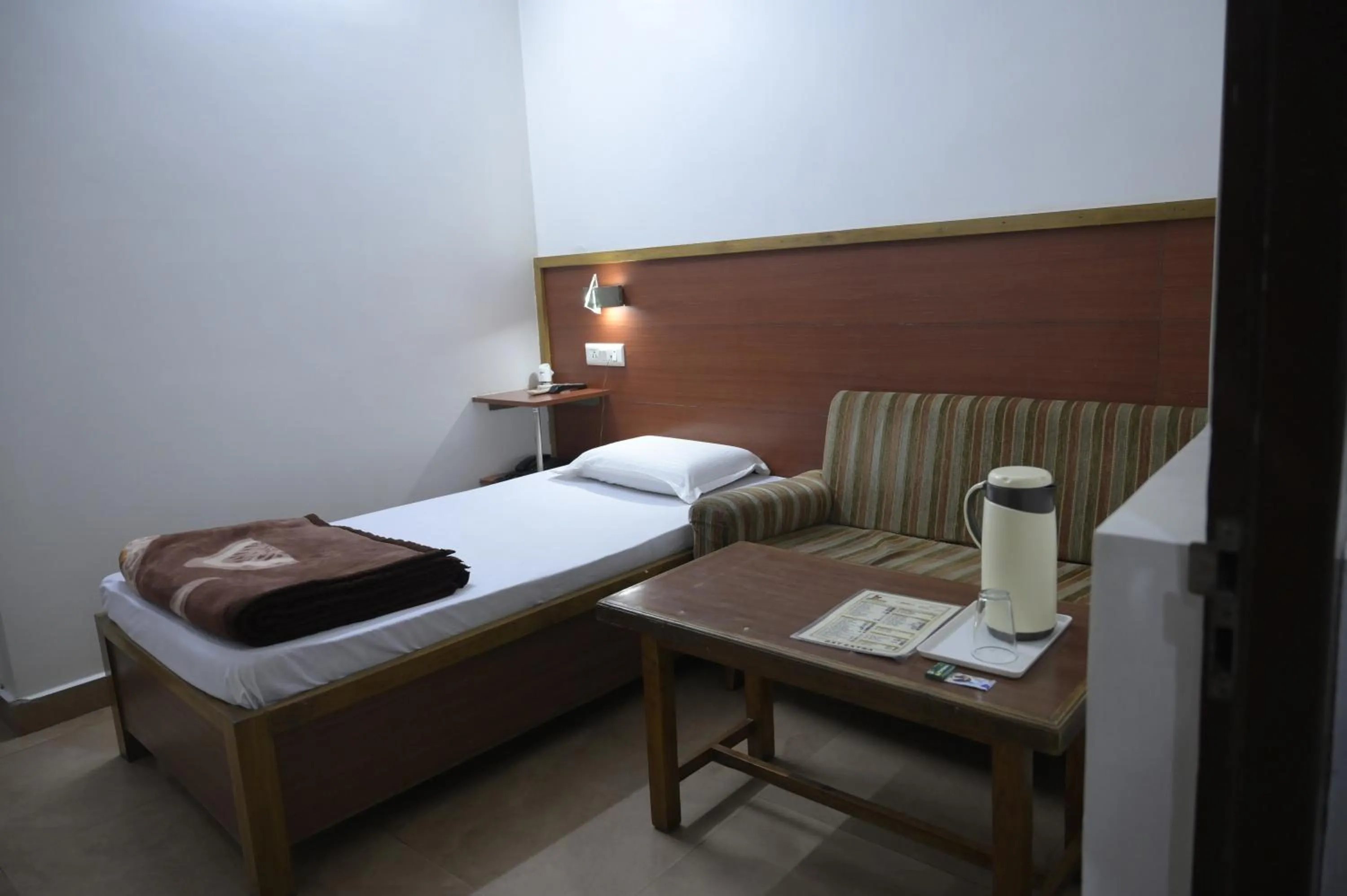 Bed in Subhash Hotel