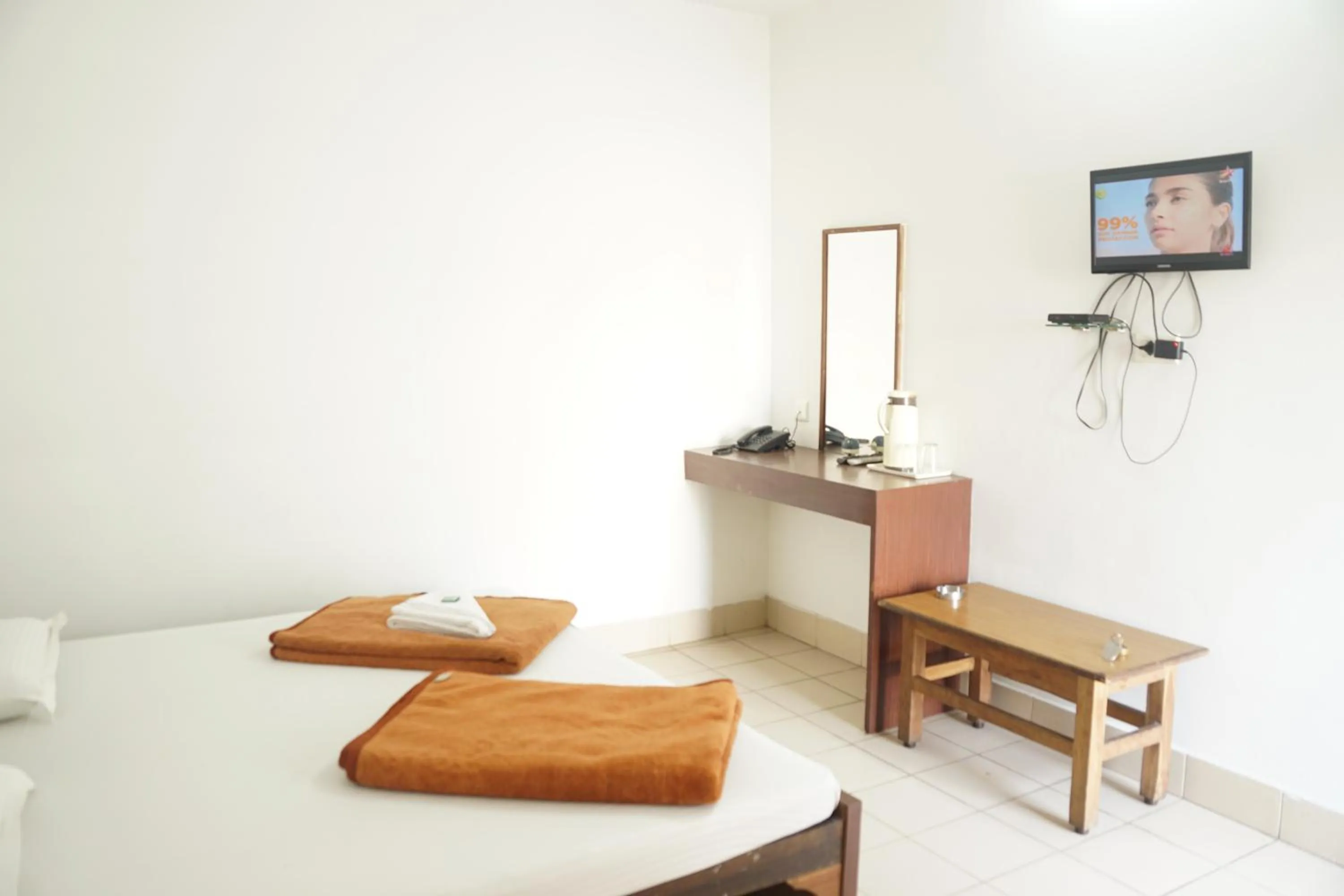 Bed in Subhash Hotel