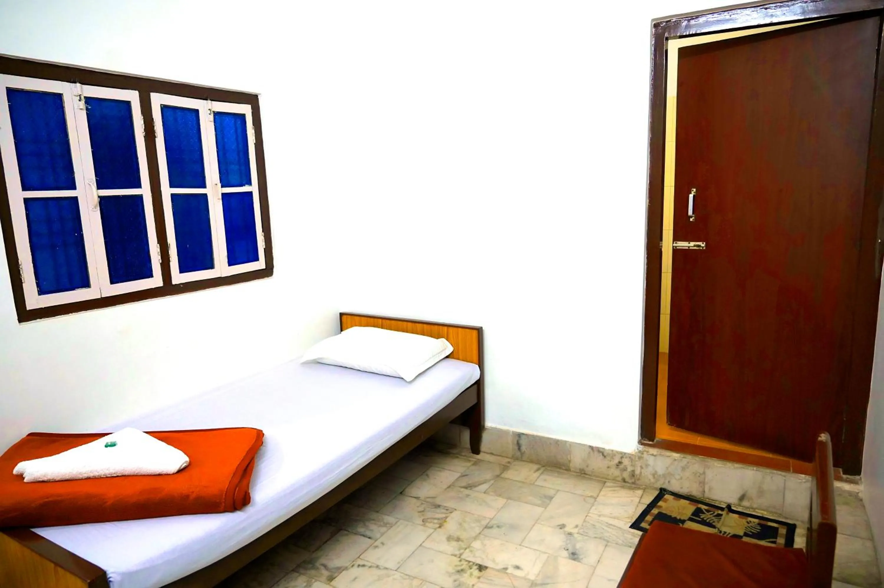 Bed in Subhash Hotel