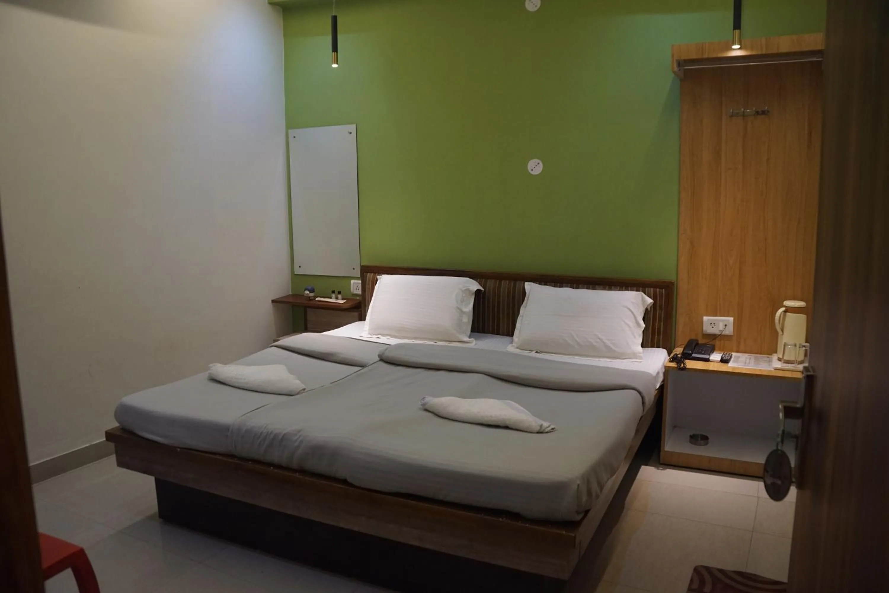 Bed in Subhash Hotel