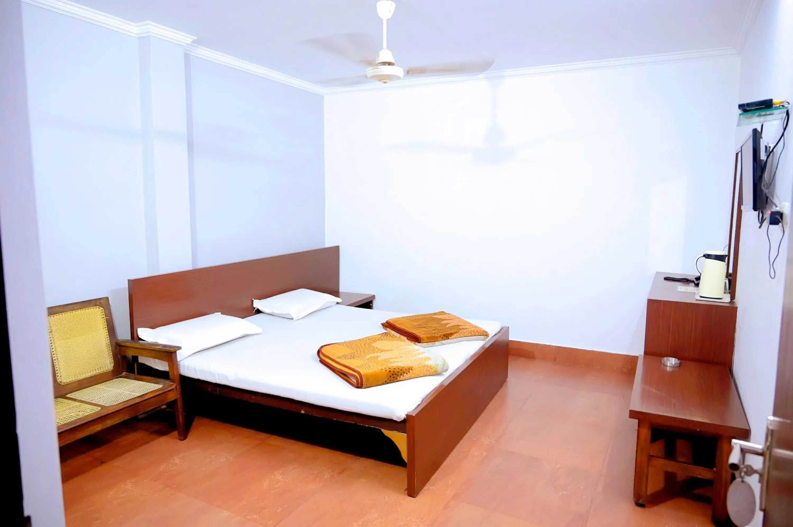 Bed in Subhash Hotel