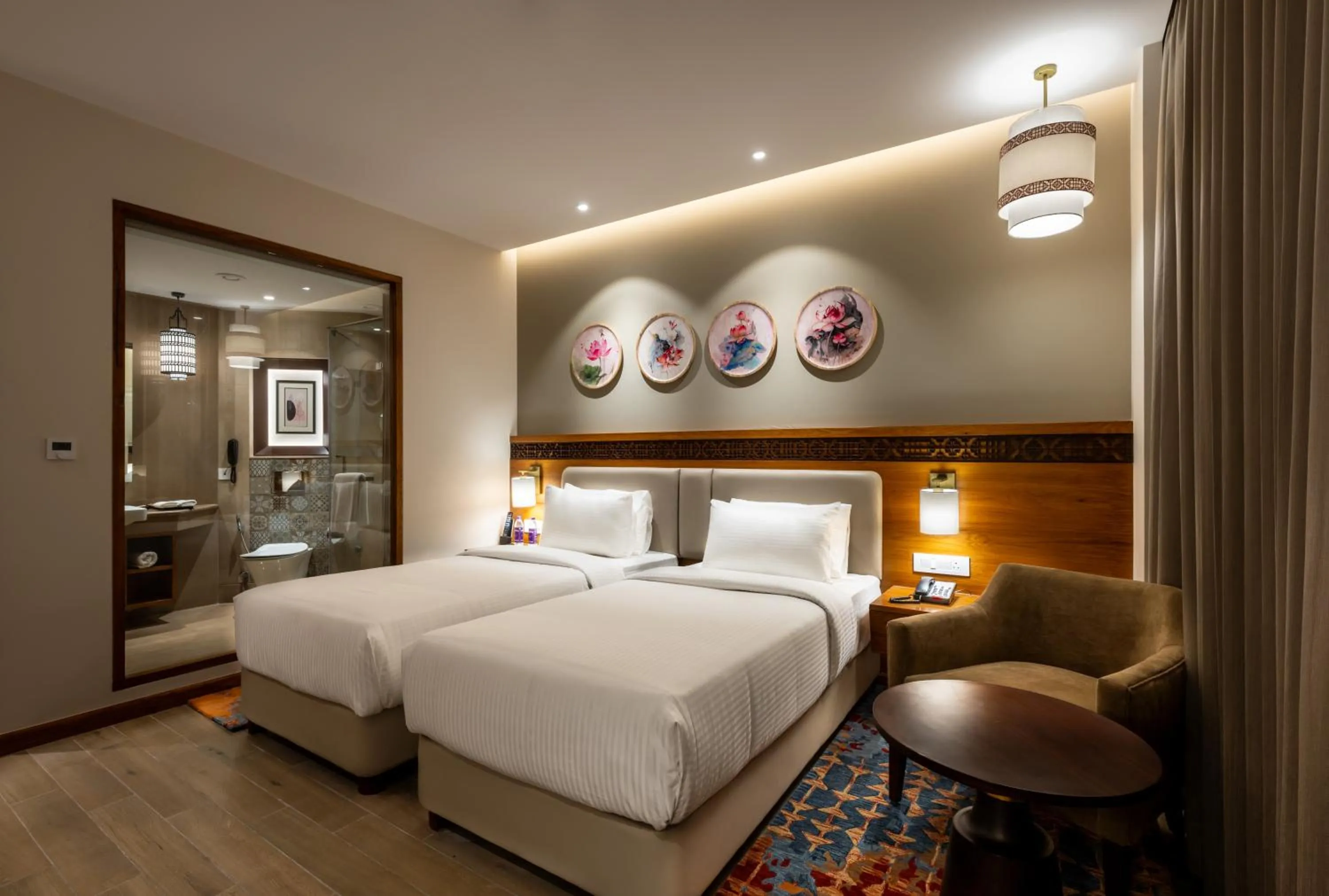 Bed in Charmwood Hotel