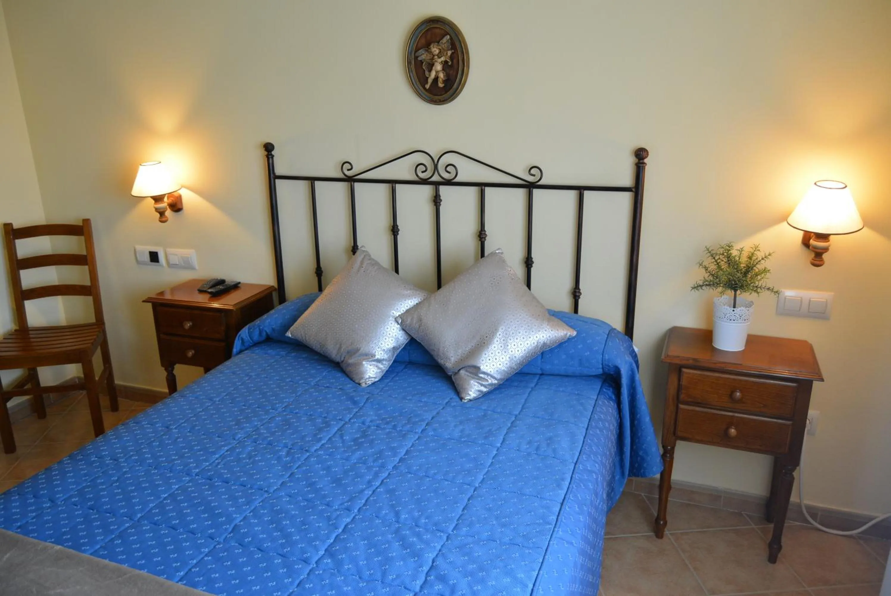 Decorative detail, Bed in Hotel Mayno