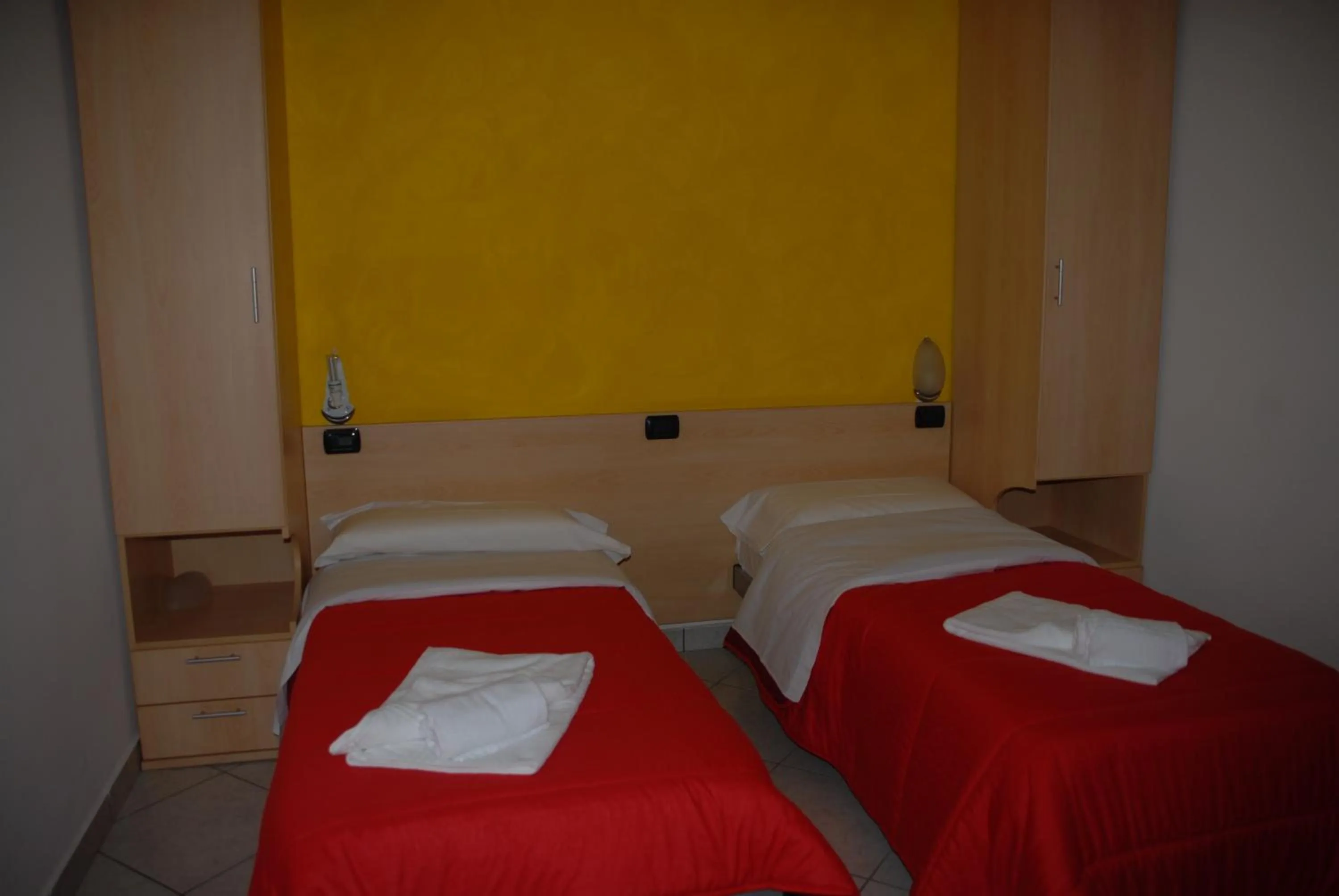 Bed in Hotel Ristorante Il Calipso by Mago