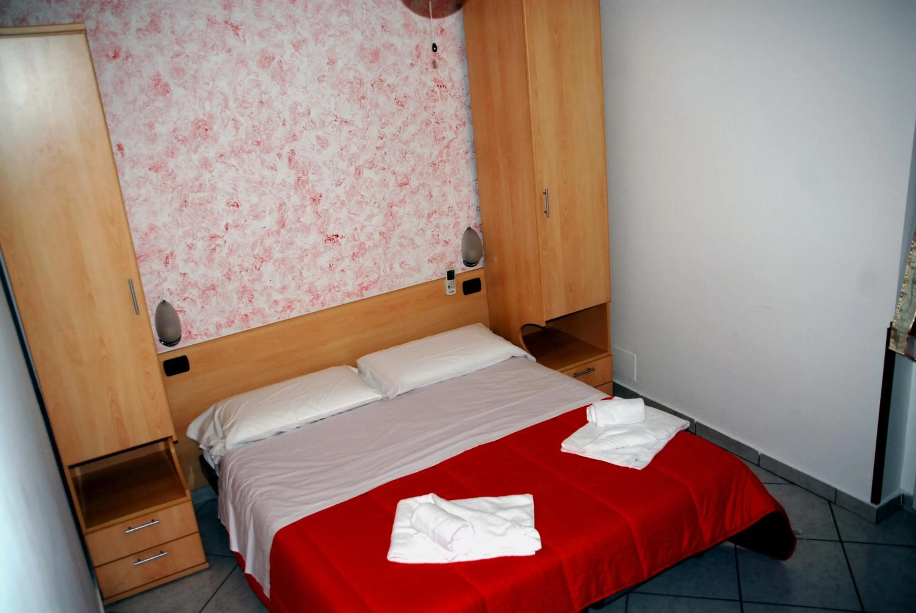 Bed in Hotel Ristorante Il Calipso by Mago