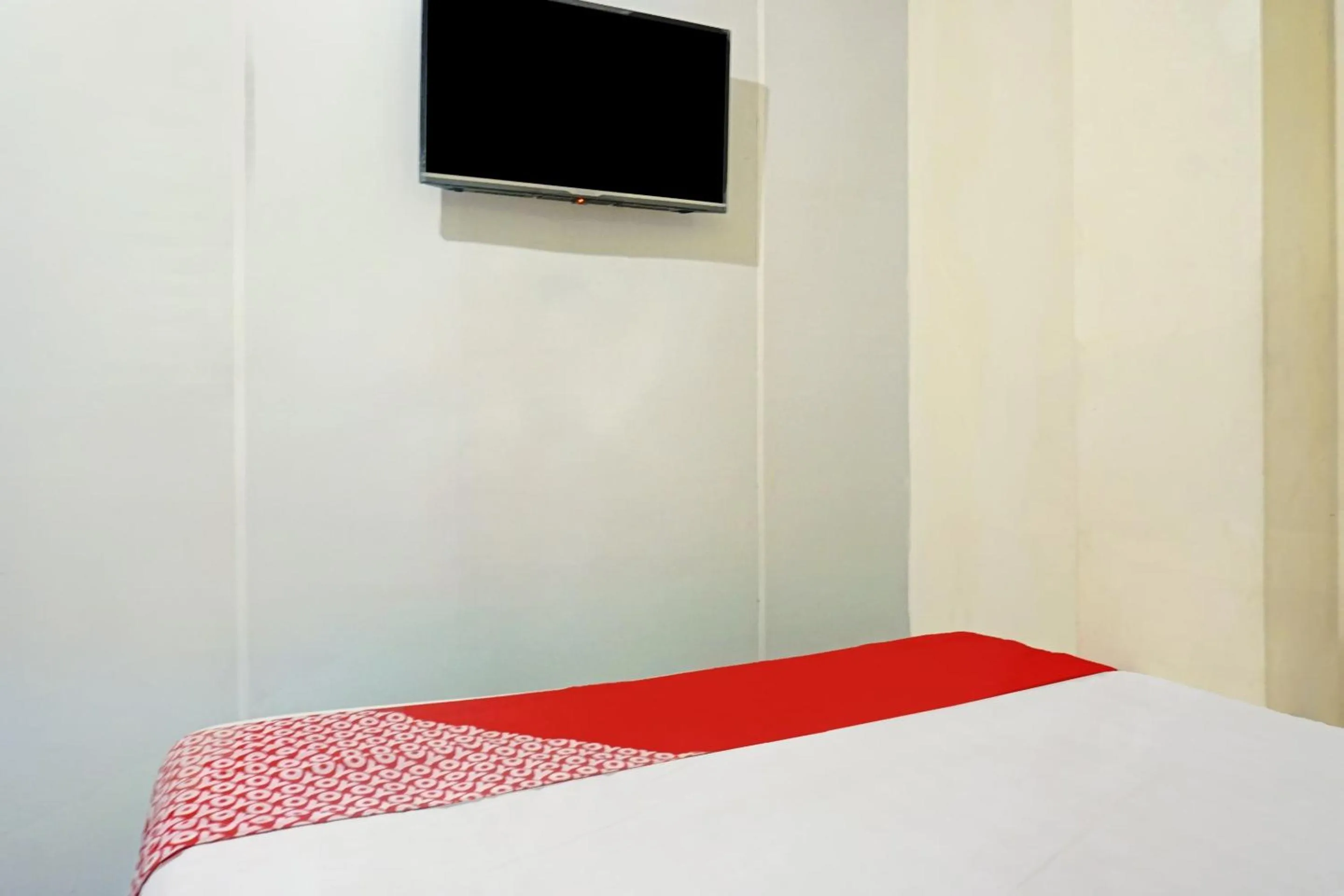 Bedroom, Bed in Hotel O J&b Room Pramuka