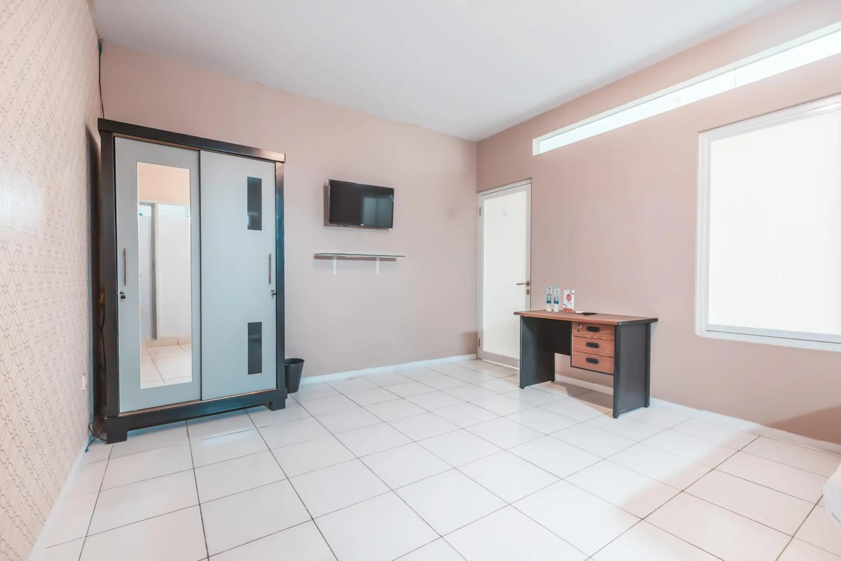 Bedroom in Hotel O J&b Room Pramuka