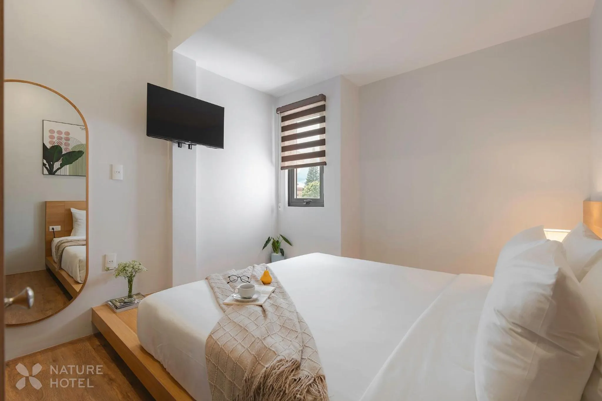 Communal lounge/ TV room, Bed in Nature Hotel - Le Hong Phong