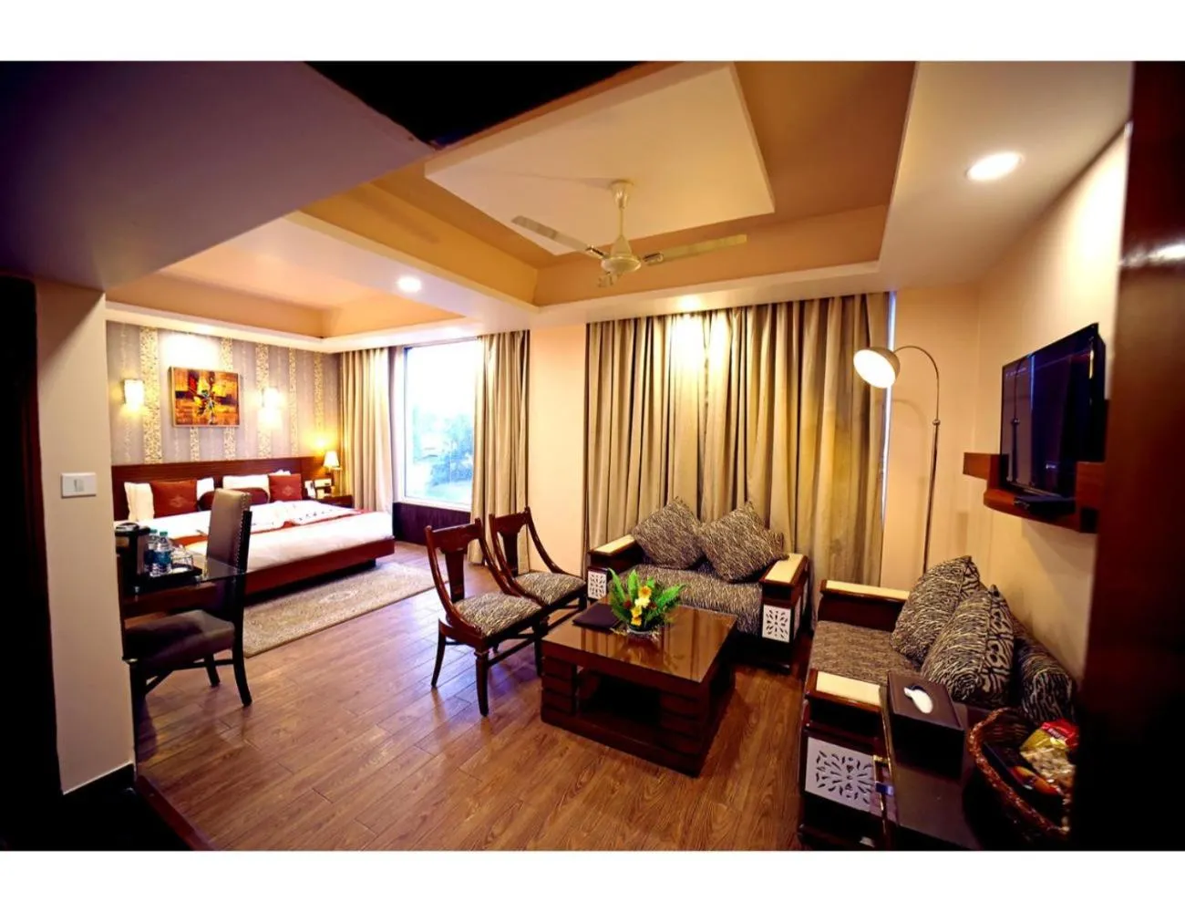 Communal lounge/ TV room, Bed in The Red Velvet Hotel Samarpan, Patna