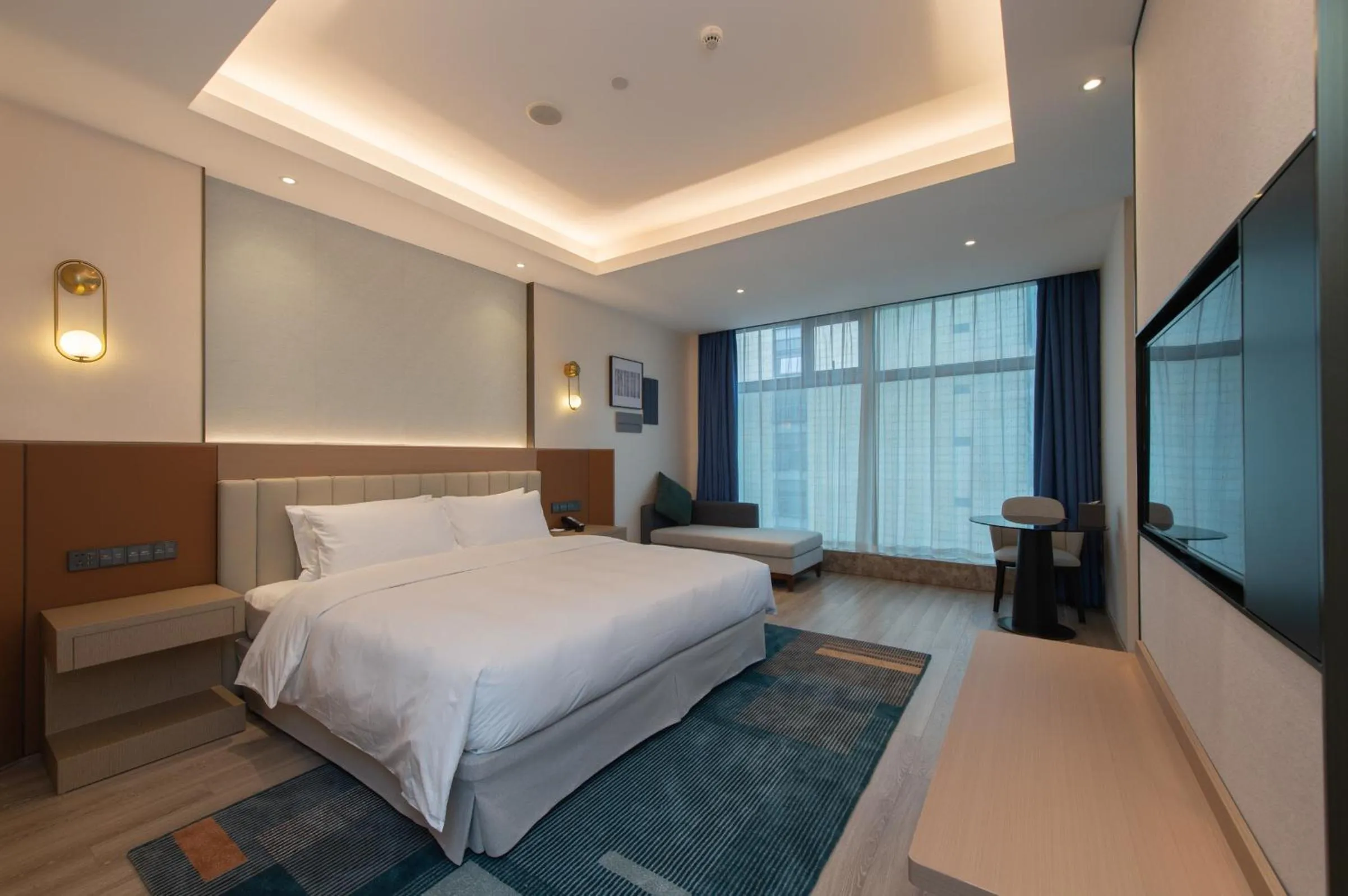 Photo of the whole room, Bed in Novotel Wuxi