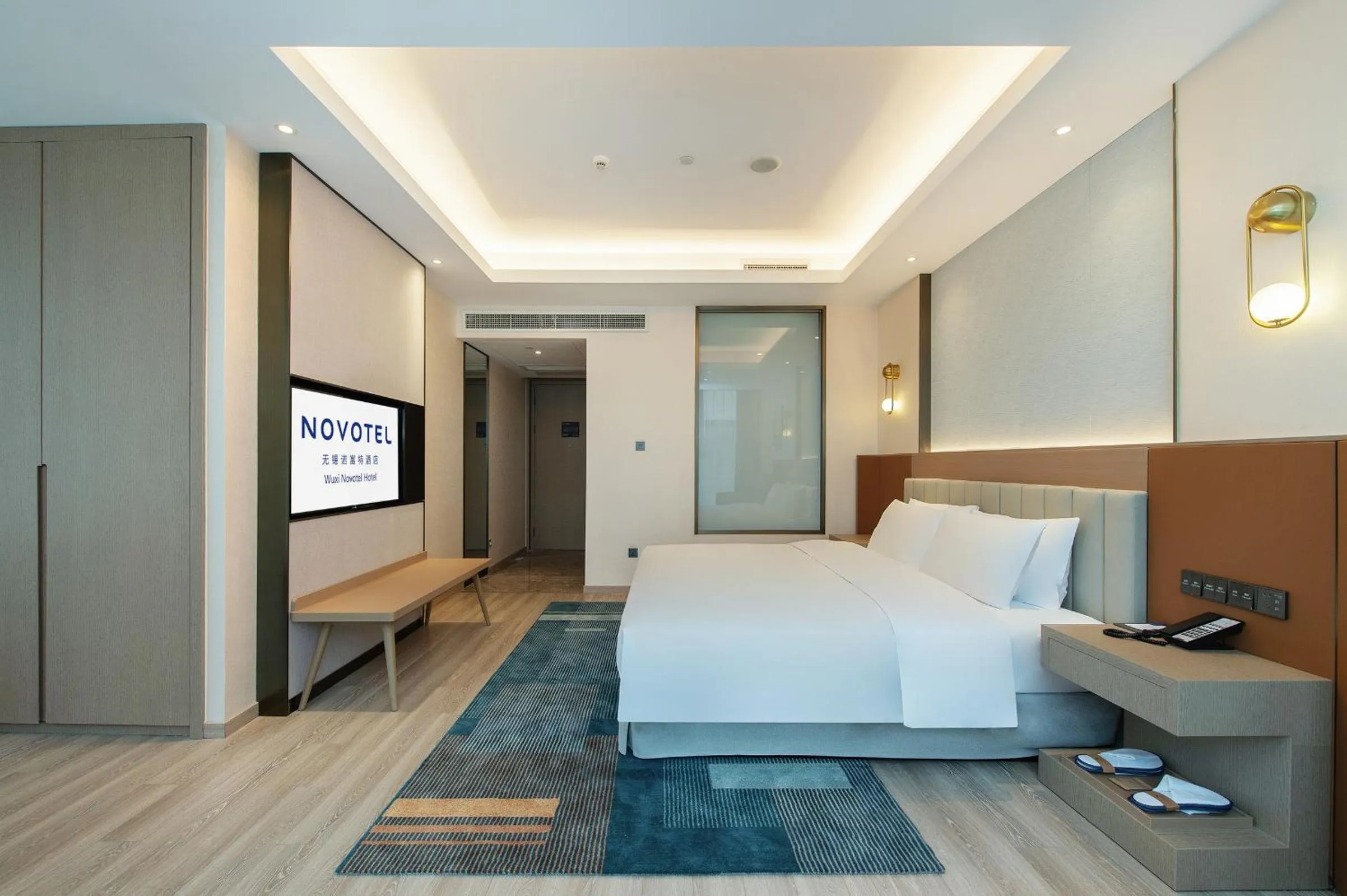 Photo of the whole room, Bed in Novotel Wuxi