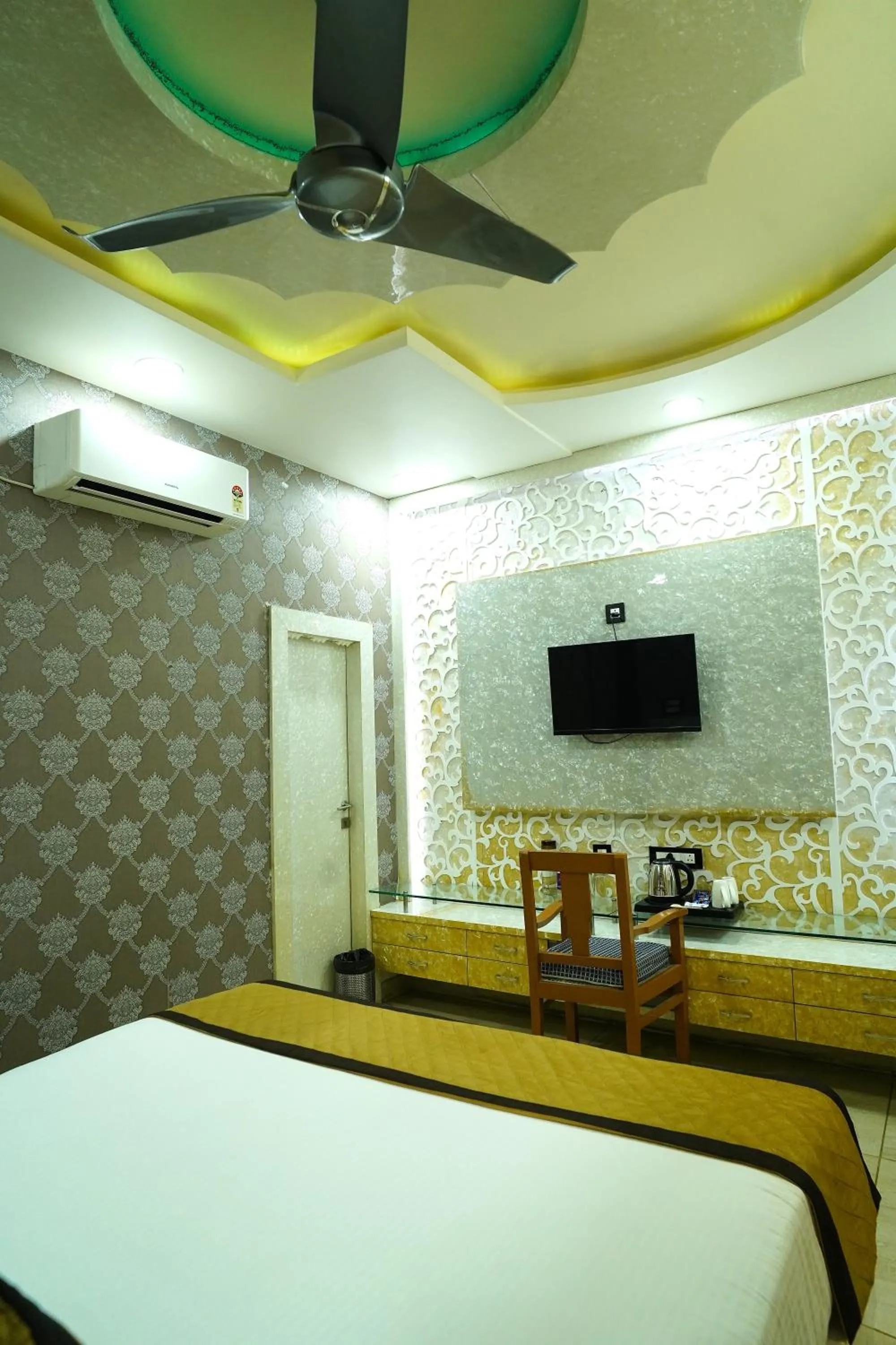 Bed in THE MANTRA- A Luxury Boutique Hotel
