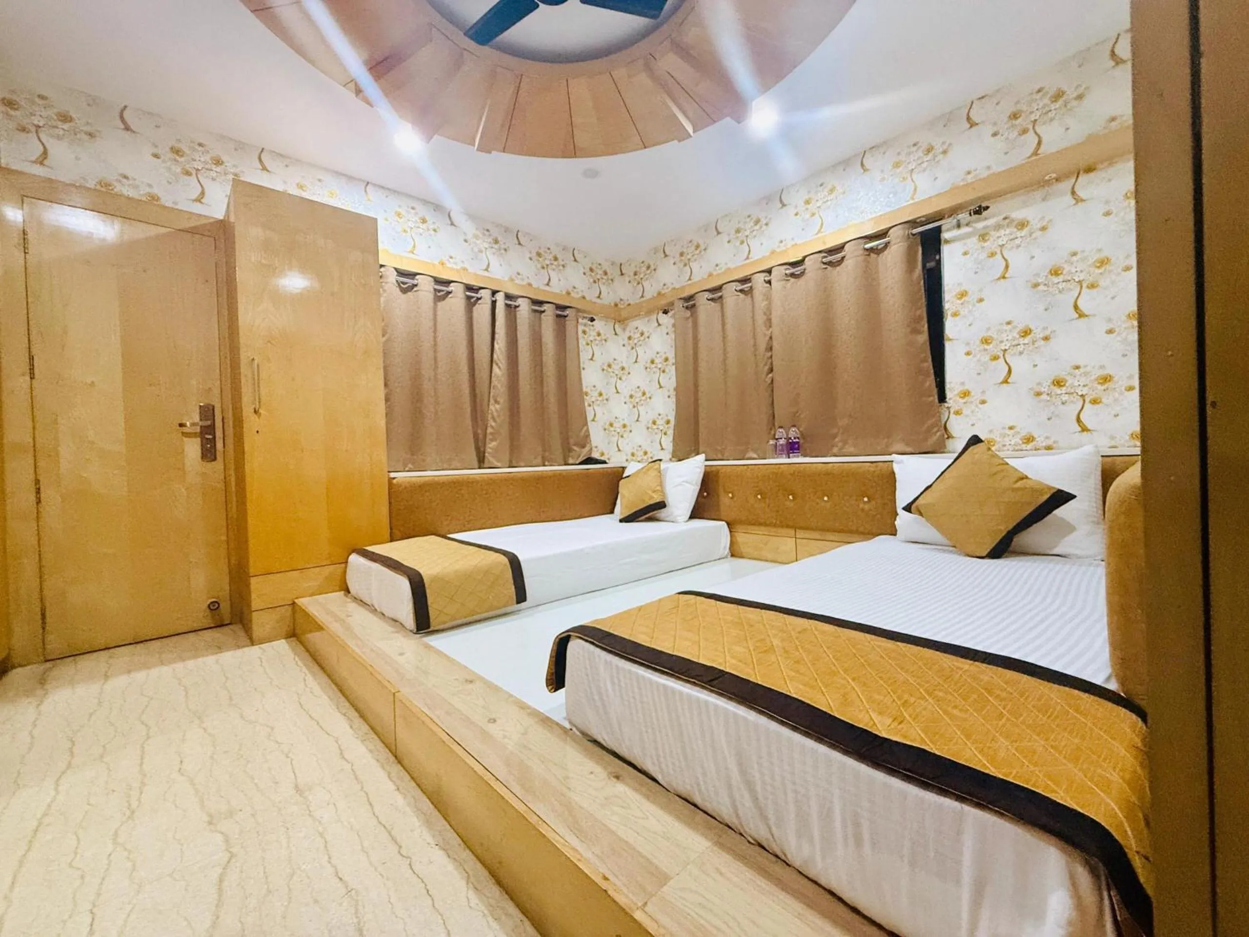 Bed in THE MANTRA- A Luxury Boutique Hotel