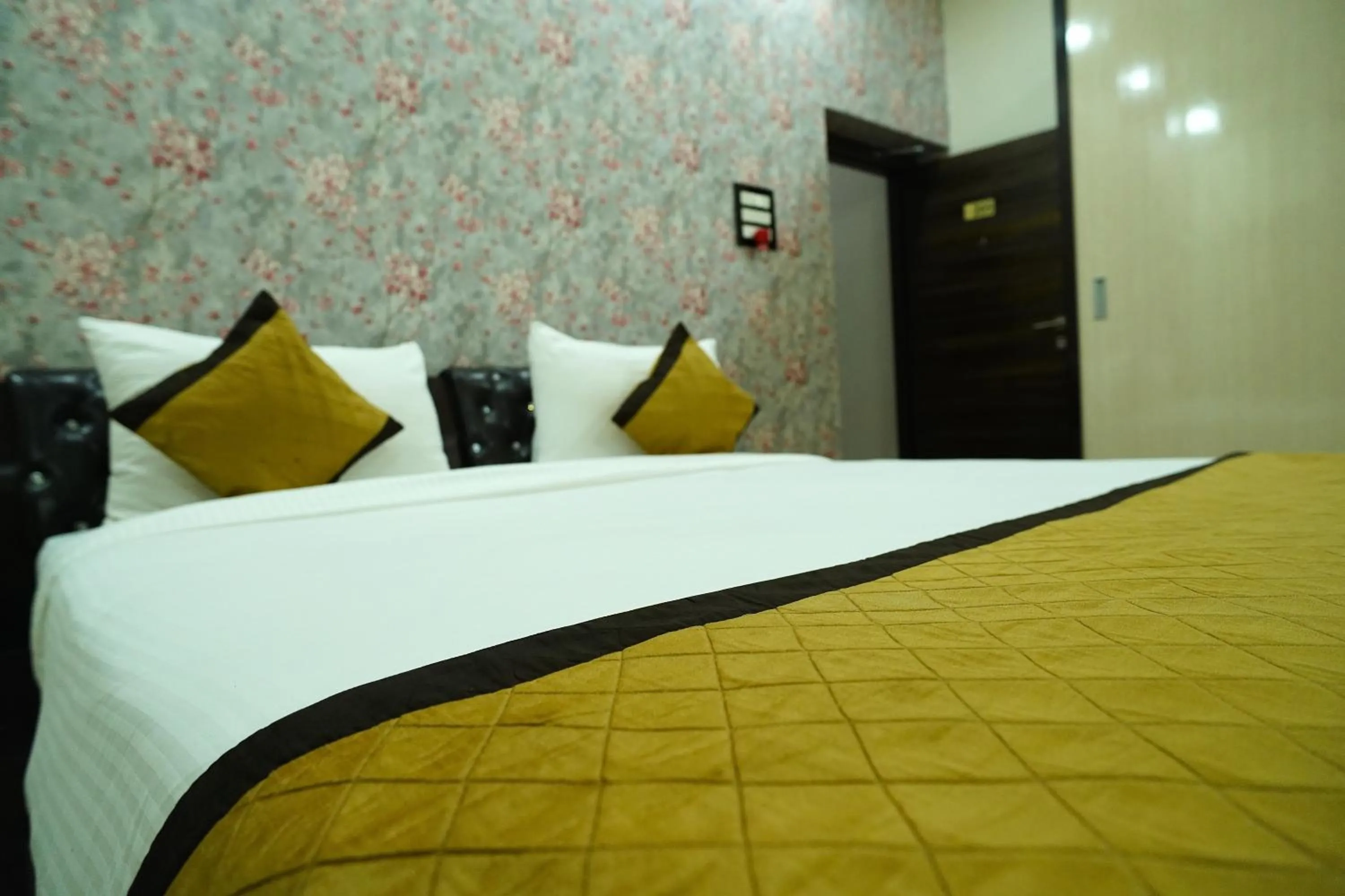 Bed in THE MANTRA- A Luxury Boutique Hotel