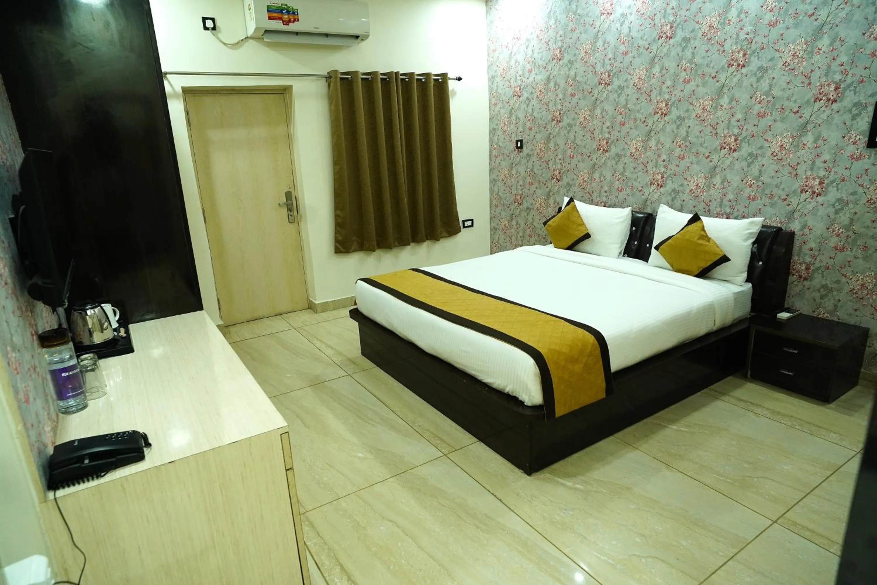 Bed in THE MANTRA- A Luxury Boutique Hotel