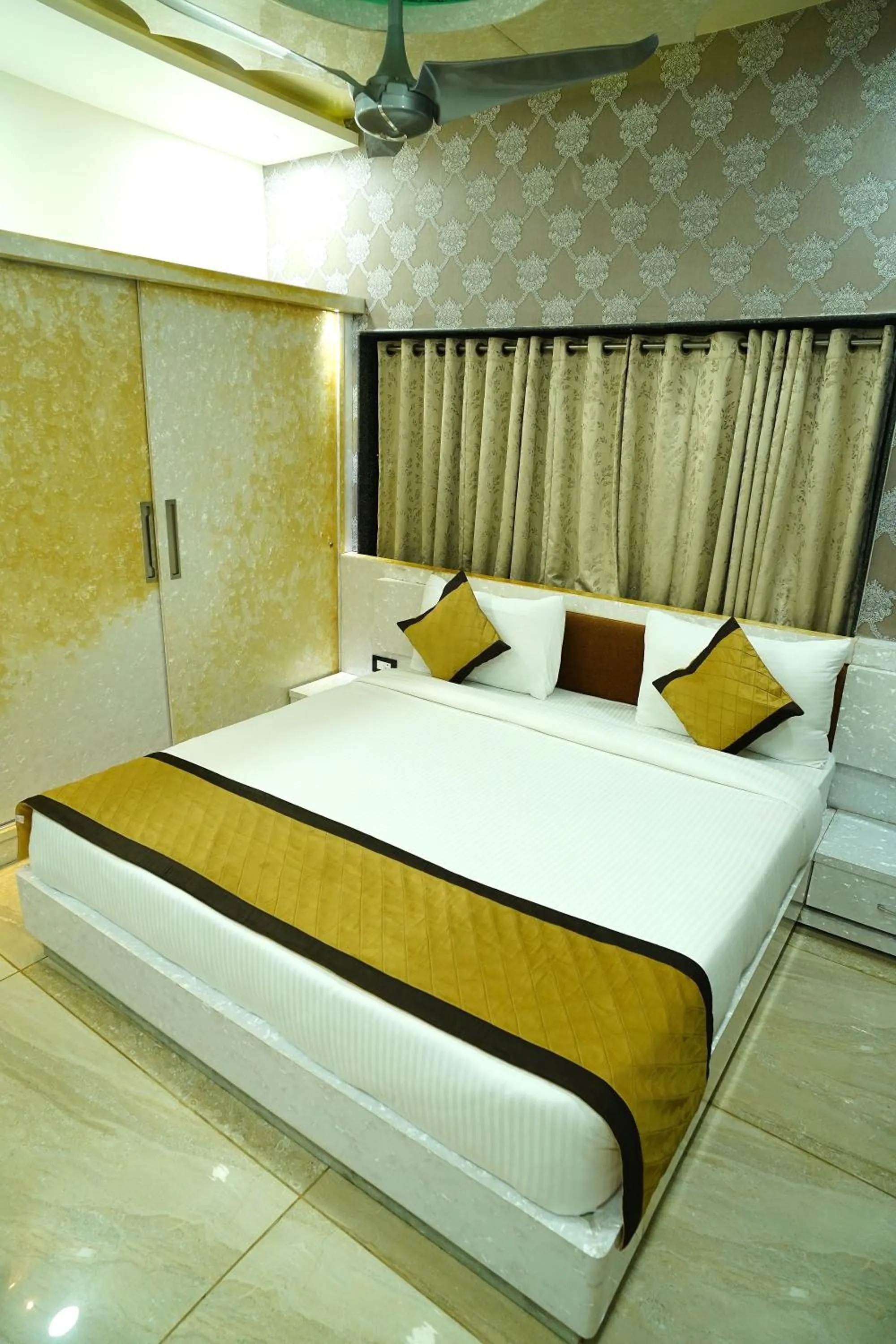 Bed in THE MANTRA- A Luxury Boutique Hotel