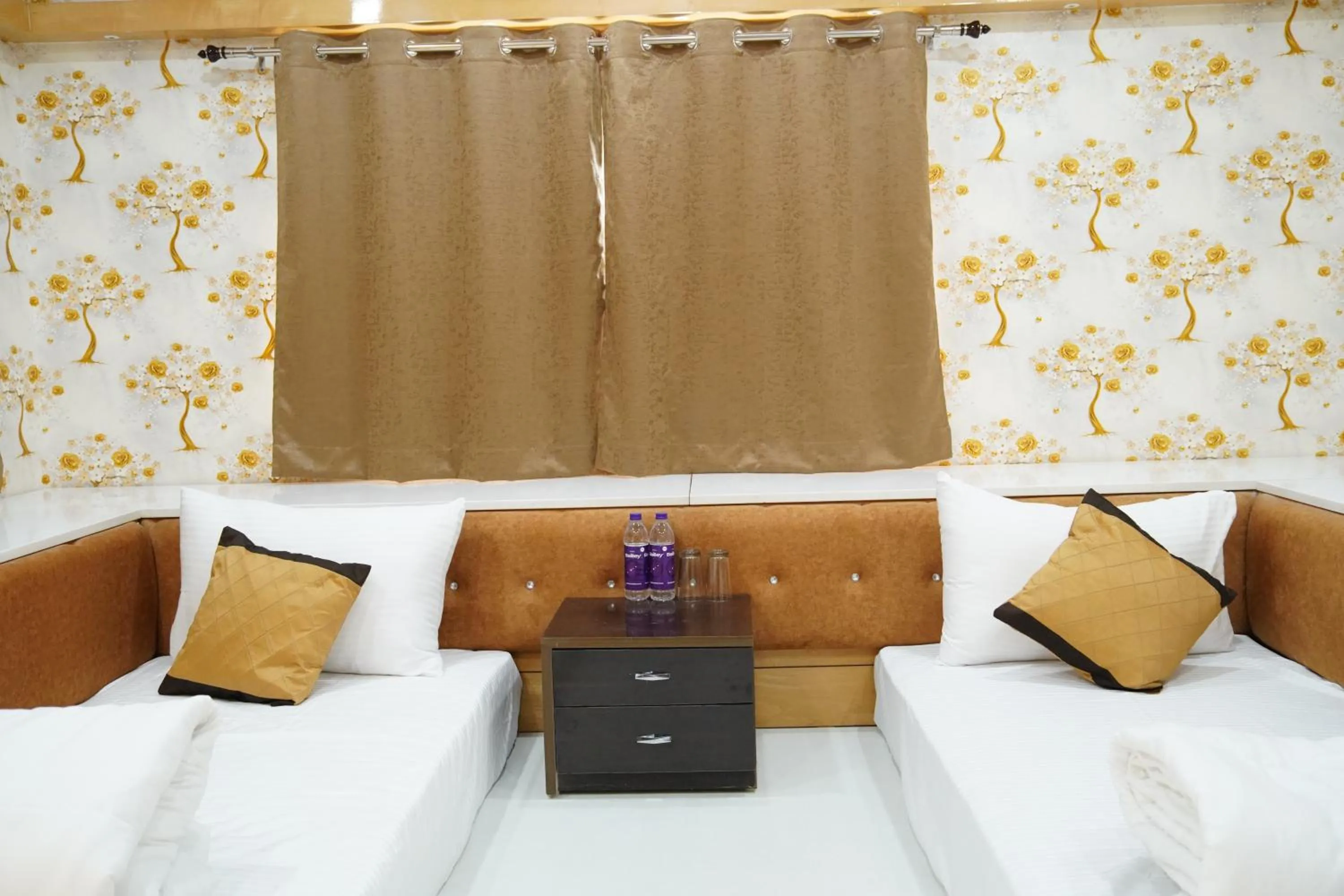 Bed in THE MANTRA- A Luxury Boutique Hotel