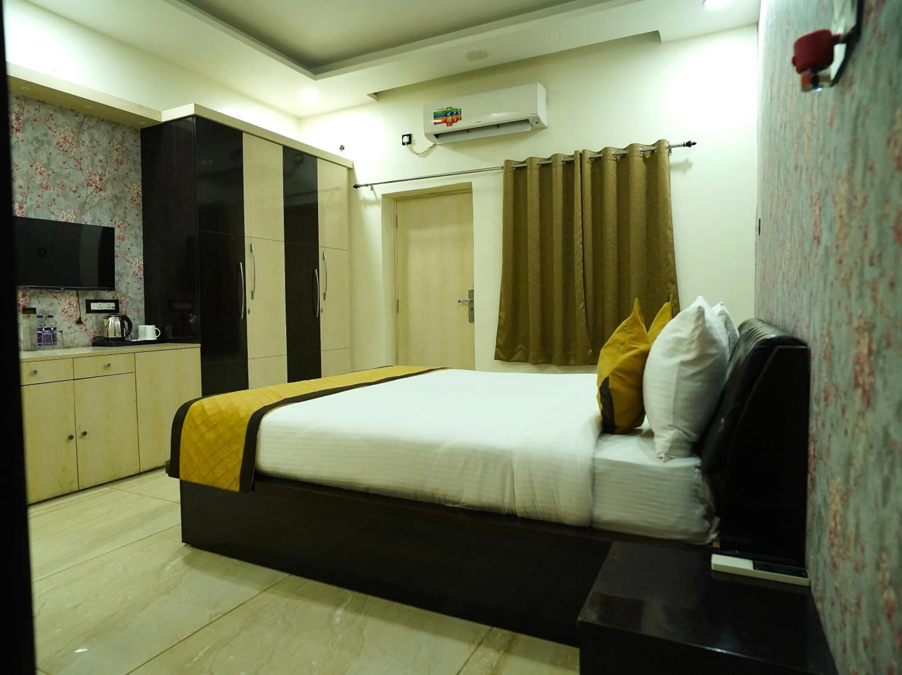 Bed in THE MANTRA- A Luxury Boutique Hotel