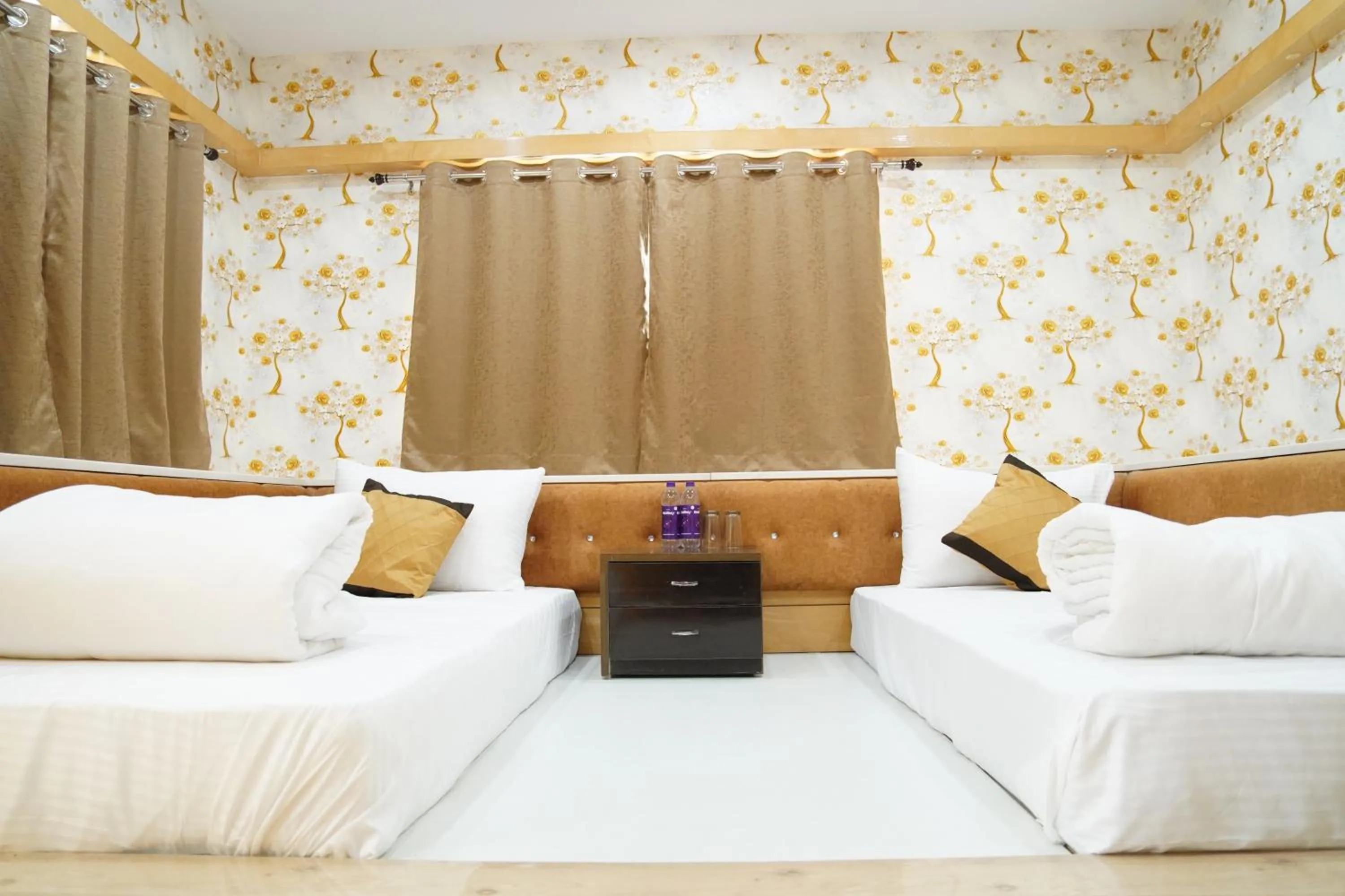 Bed in THE MANTRA- A Luxury Boutique Hotel
