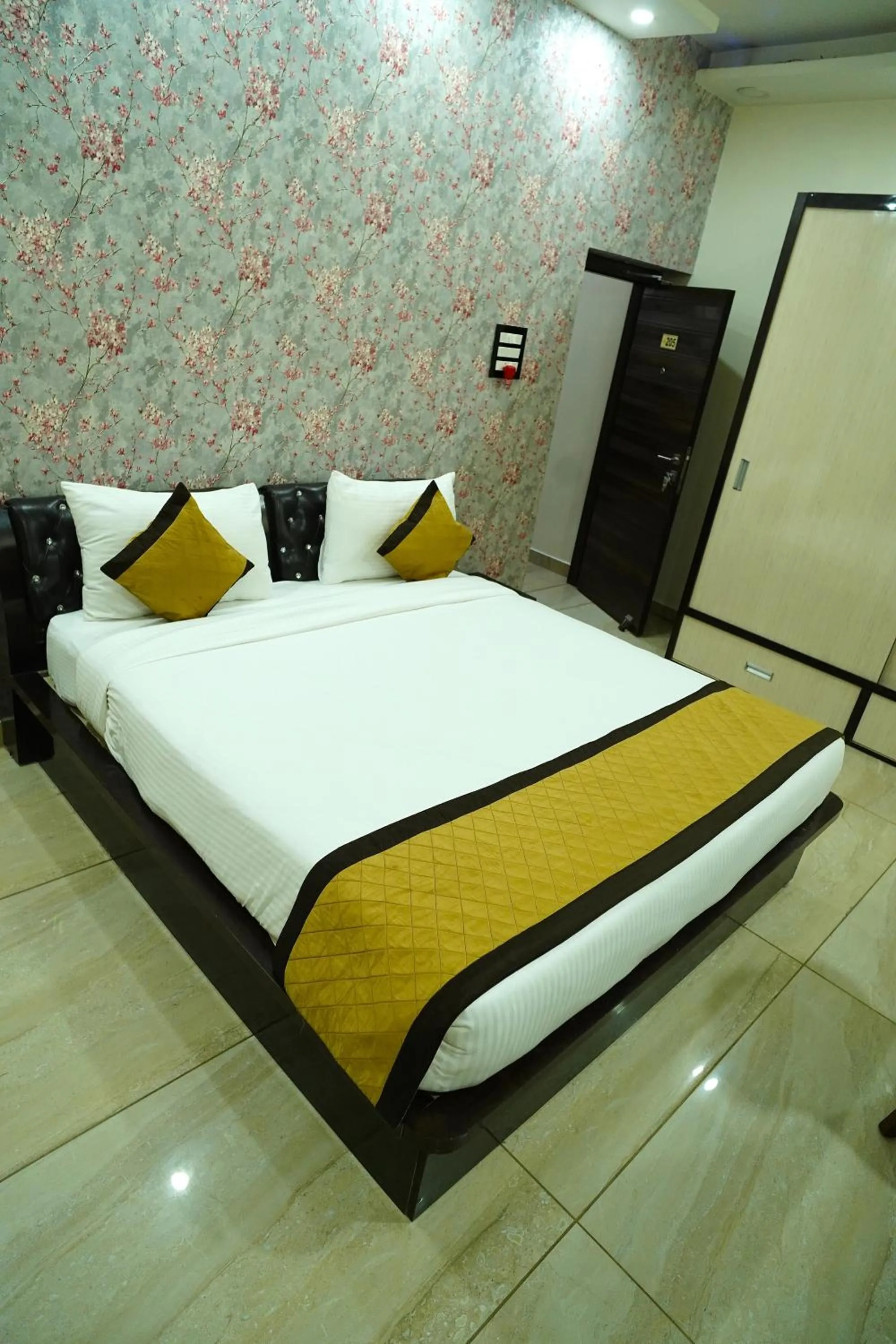 Bed in THE MANTRA- A Luxury Boutique Hotel