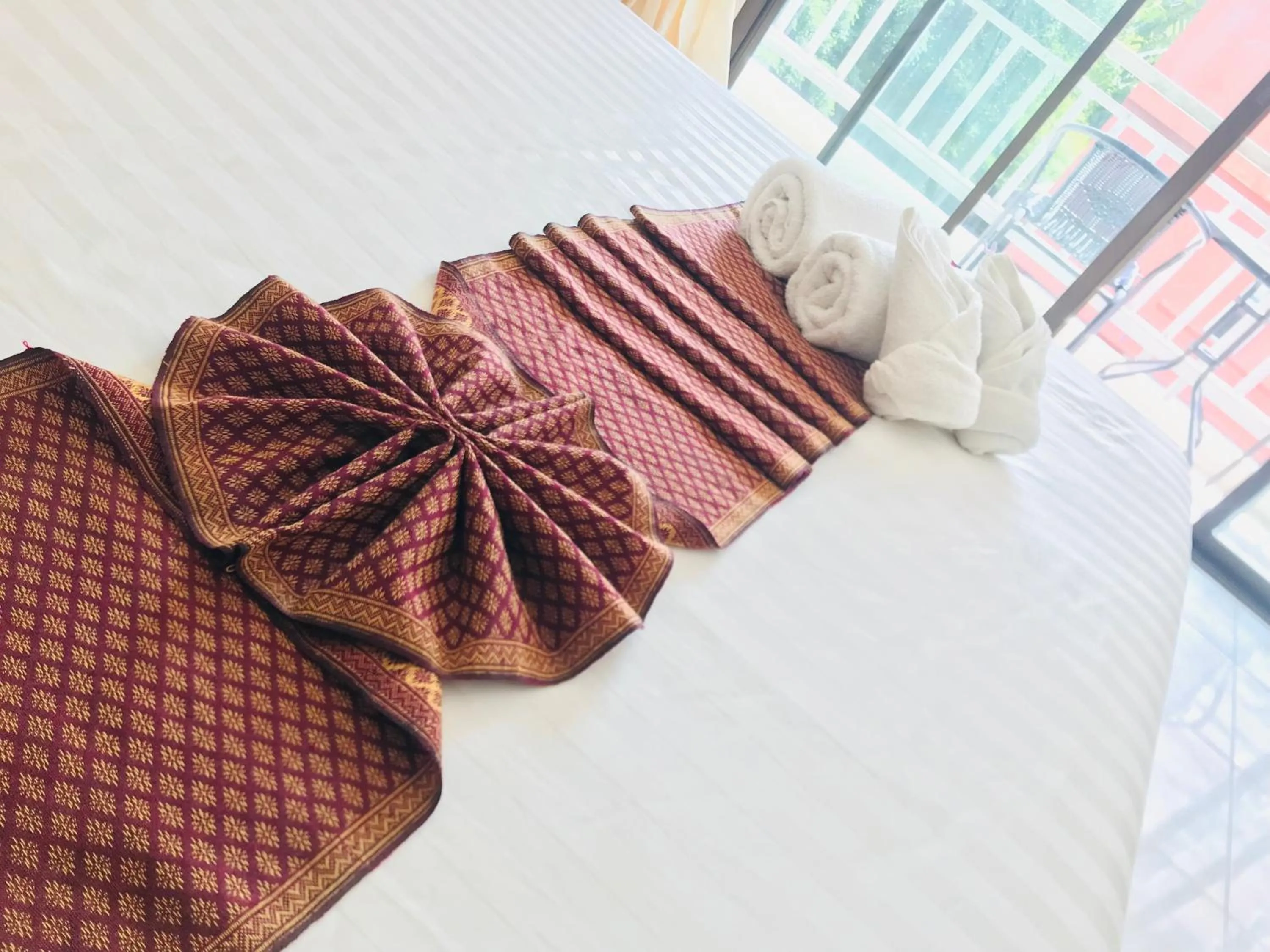 Bed in Global Hotel Beach View