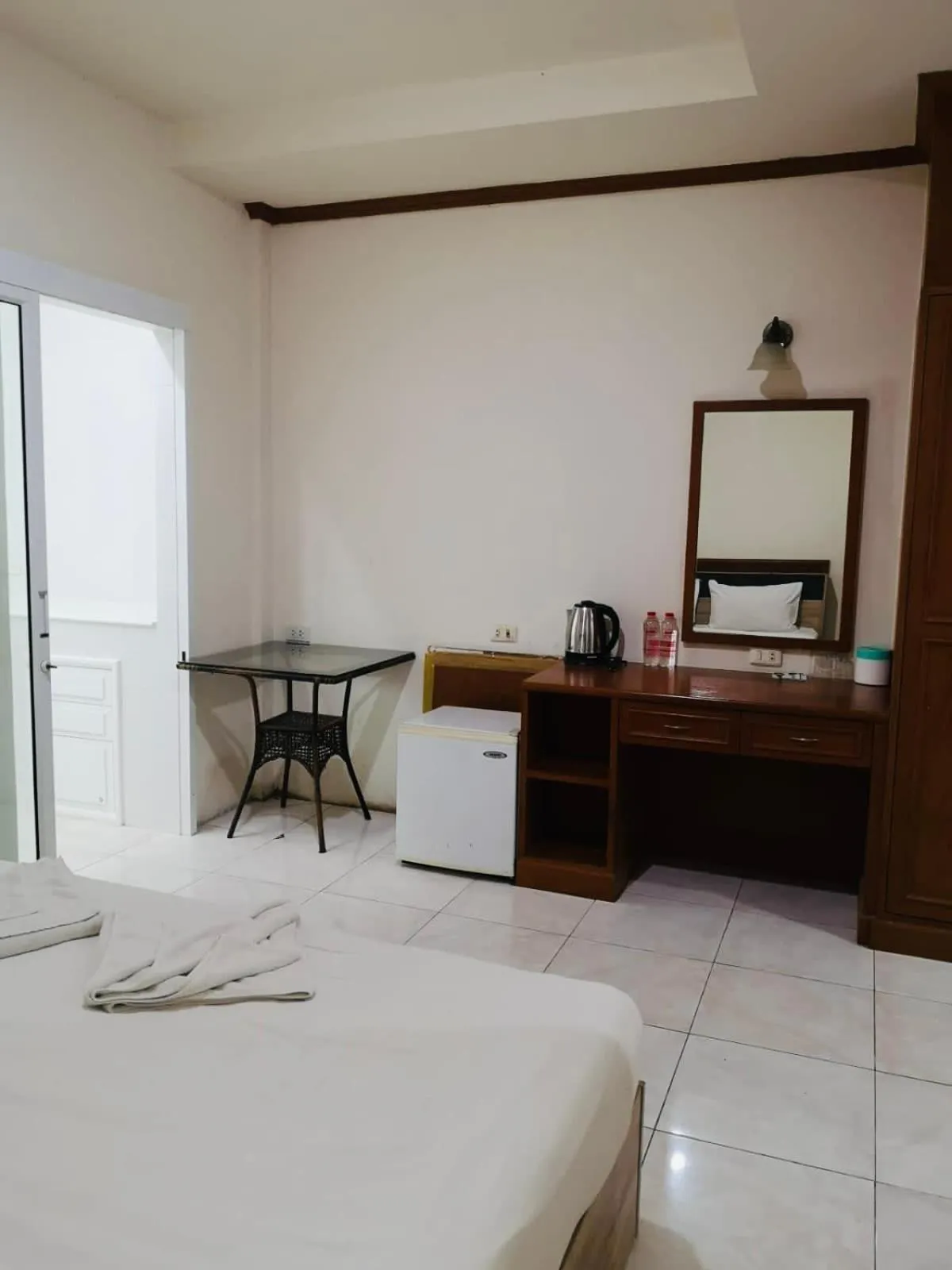 Bed in Global Hotel Beach View