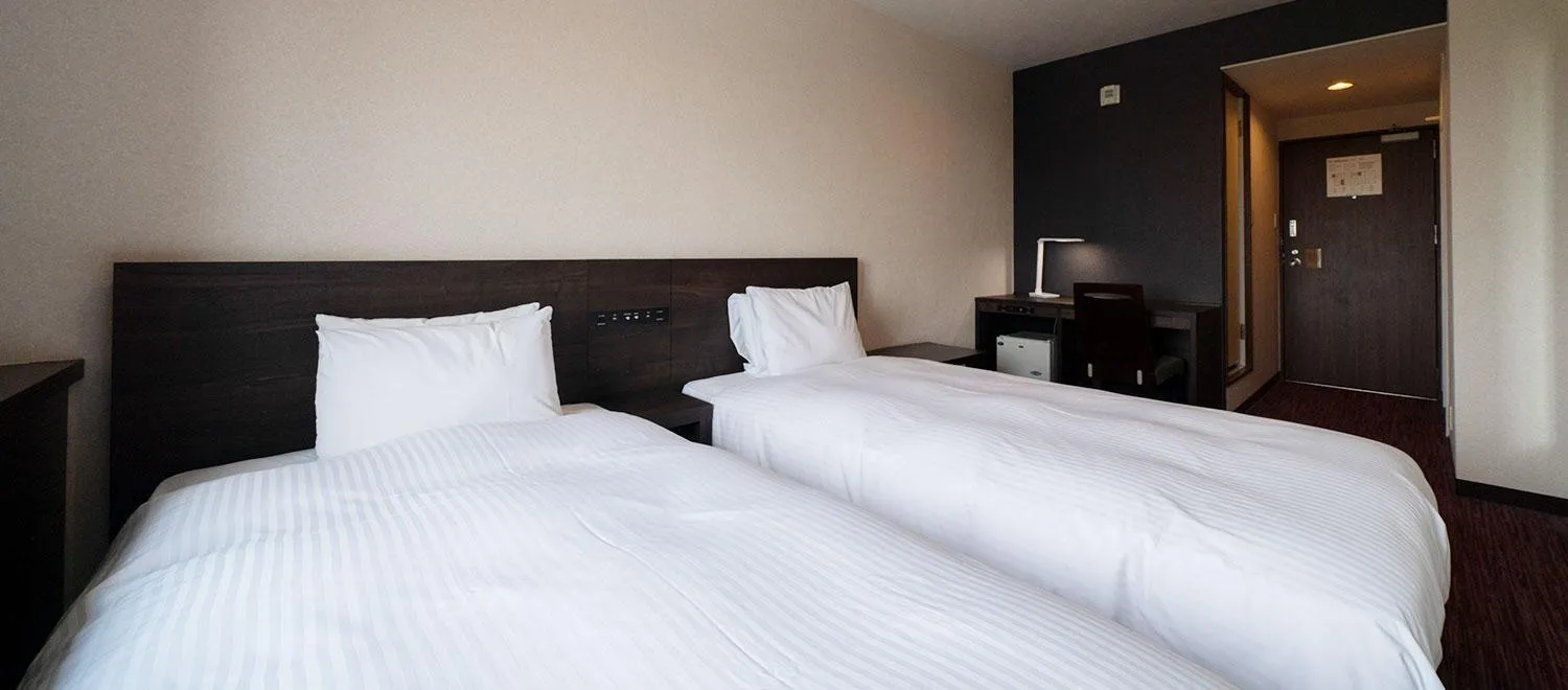 Bed in Okazaki New Grand Hotel