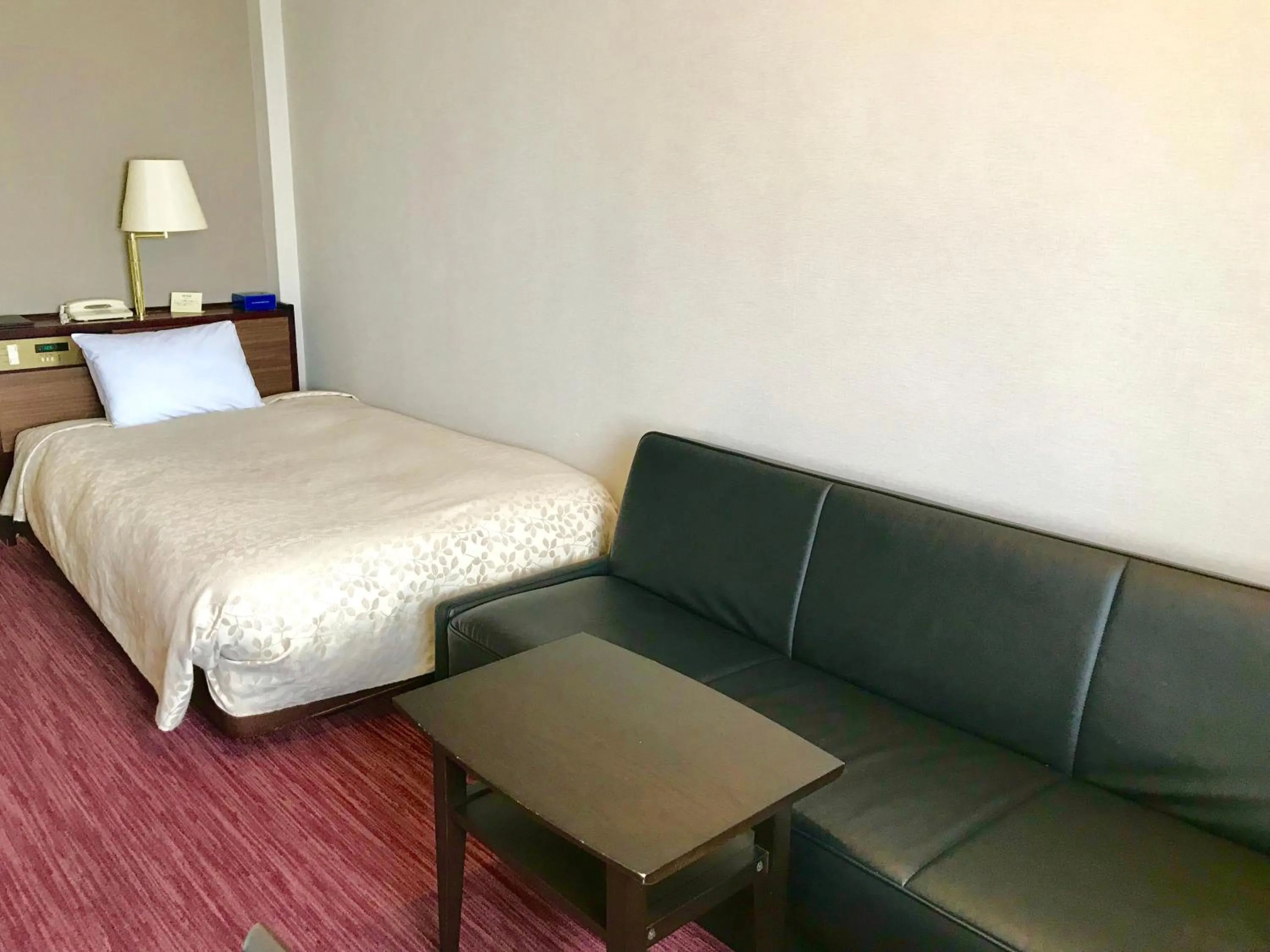 Bed in Okazaki New Grand Hotel