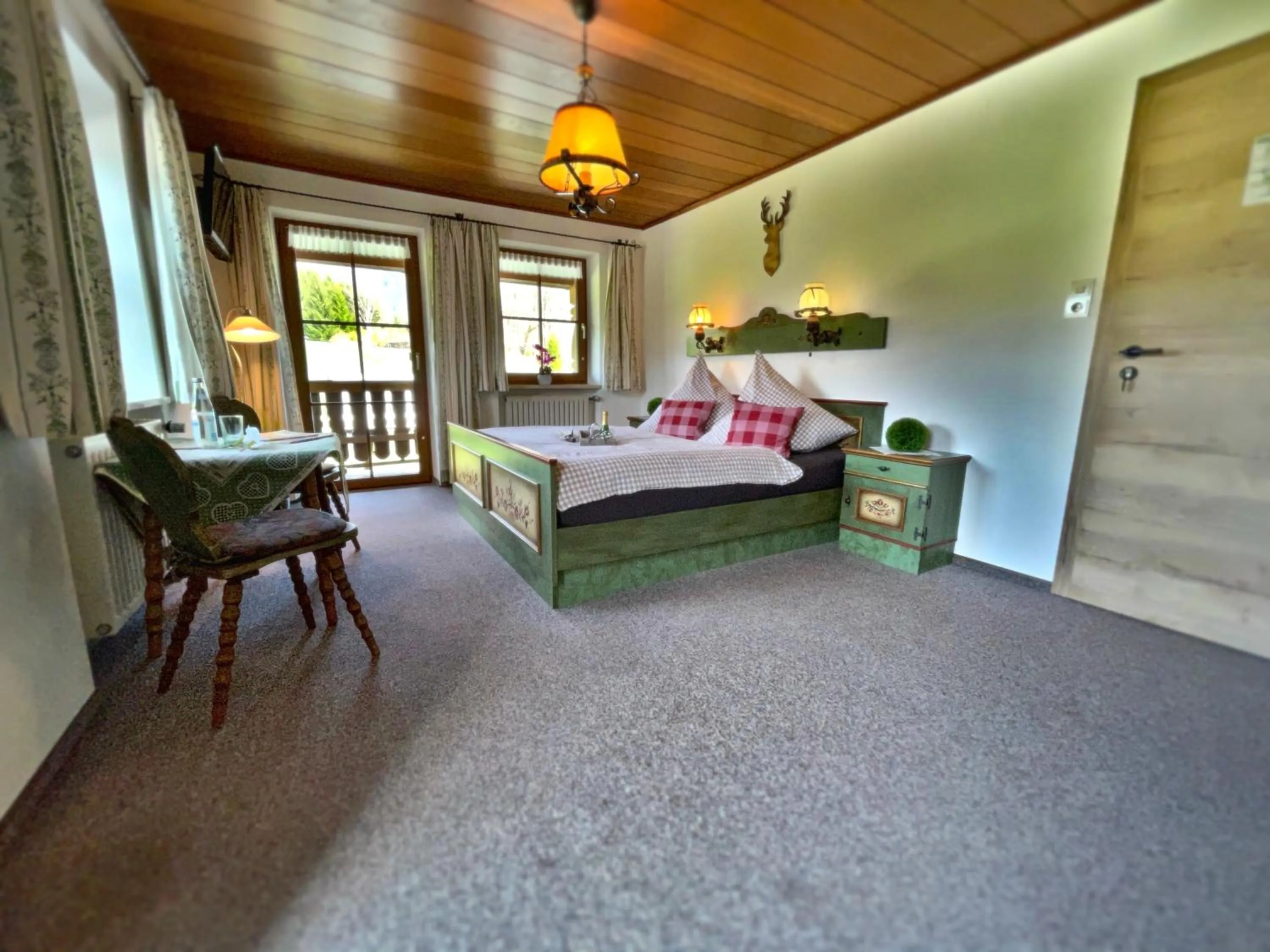 Photo of the whole room, Bed in Pension Loiplstüberl