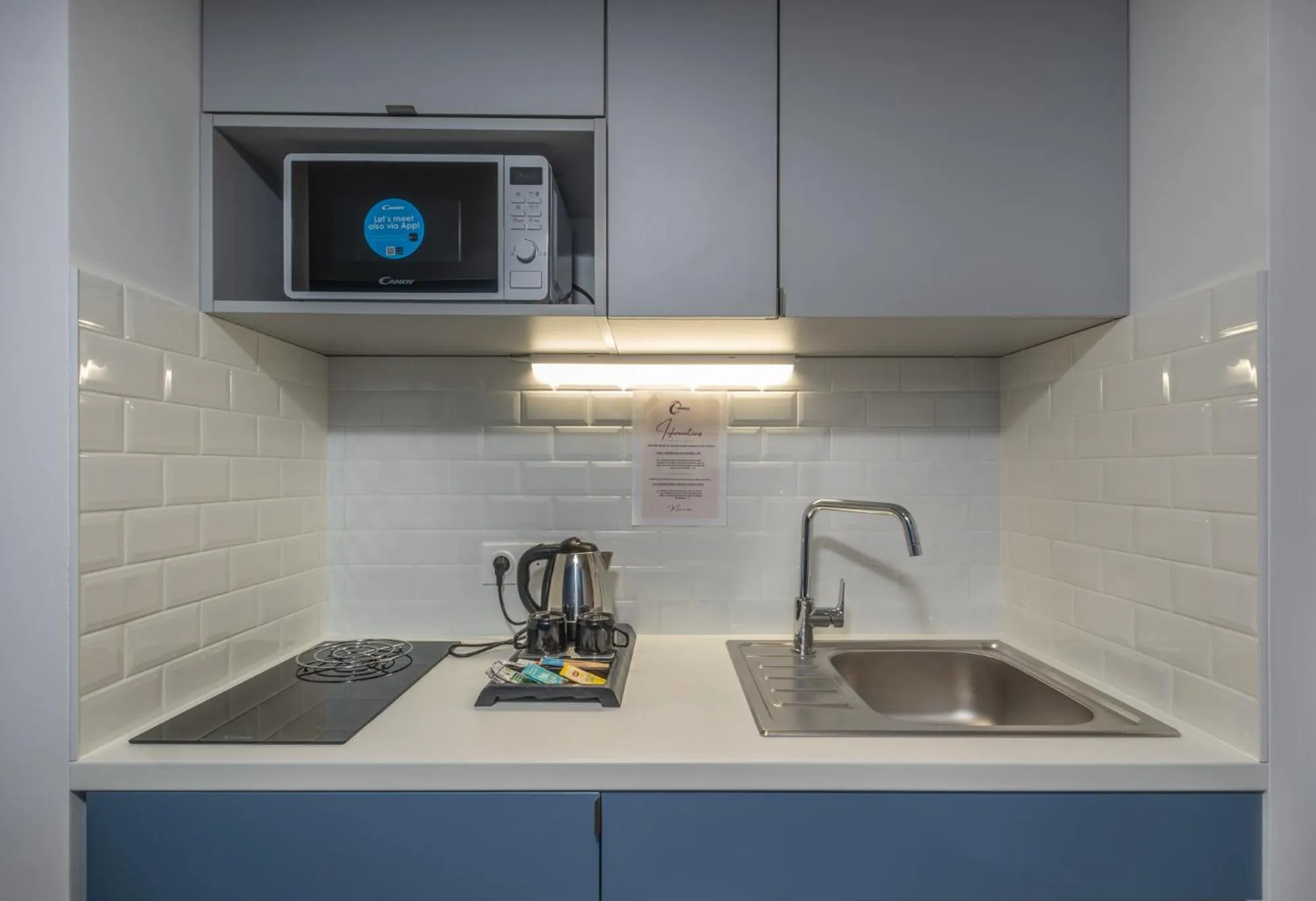 Kitchen or kitchenette in The Originals Résidence Paris Sud Villejuif