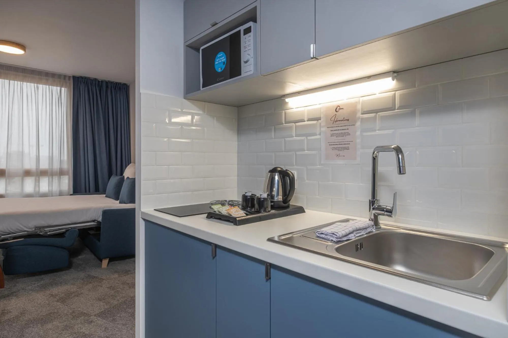 Kitchen or kitchenette in The Originals Résidence Paris Sud Villejuif