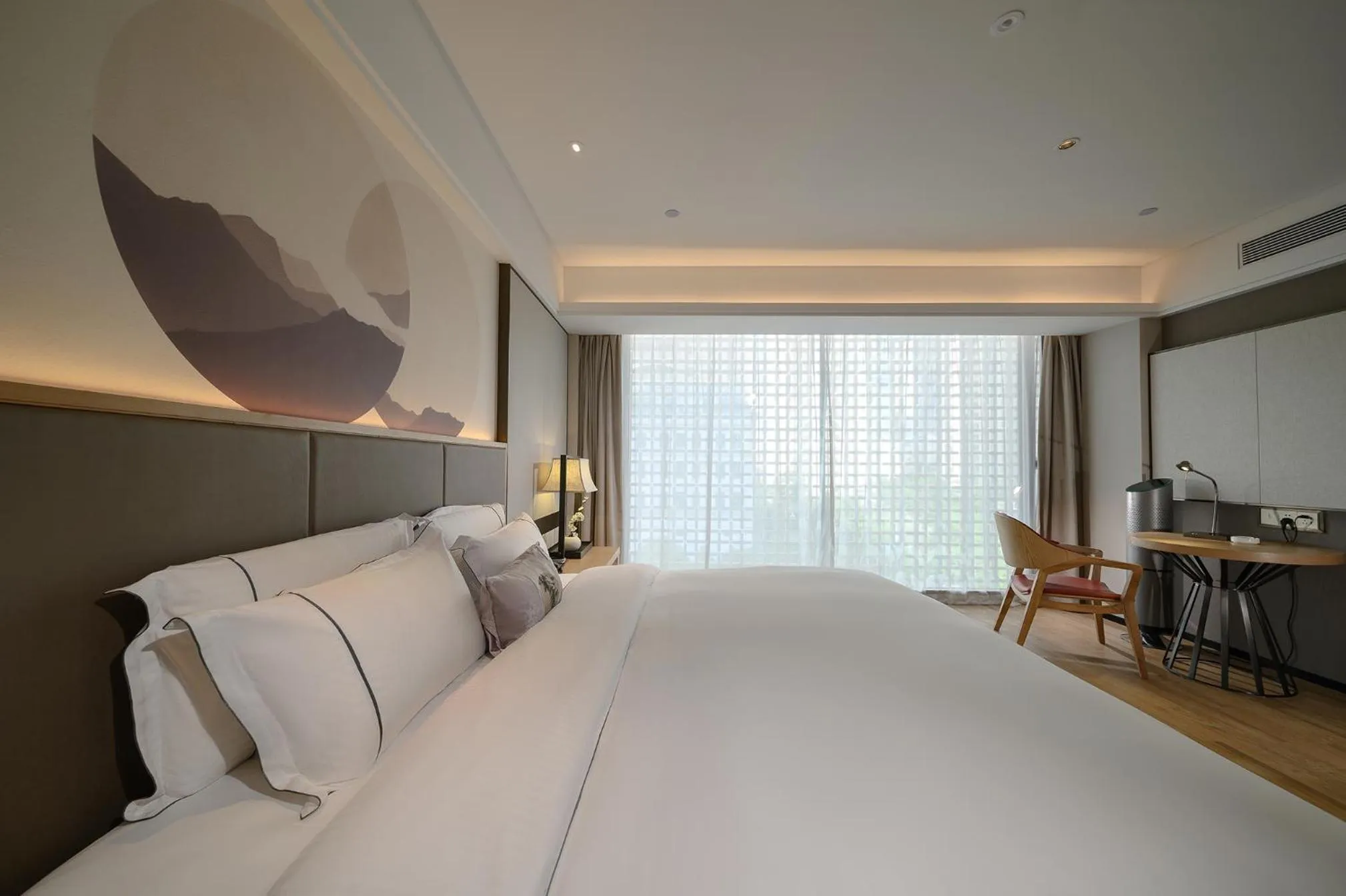 Photo of the whole room, Bed in ECHENG Hotel, Nanning Wanda Plaza Convention and Exhibition Center