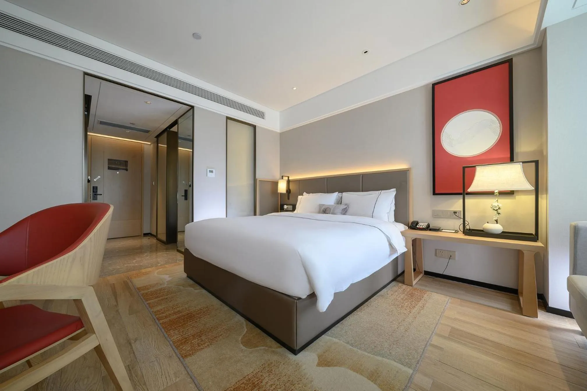Photo of the whole room, Bed in ECHENG Hotel, Nanning Wanda Plaza Convention and Exhibition Center