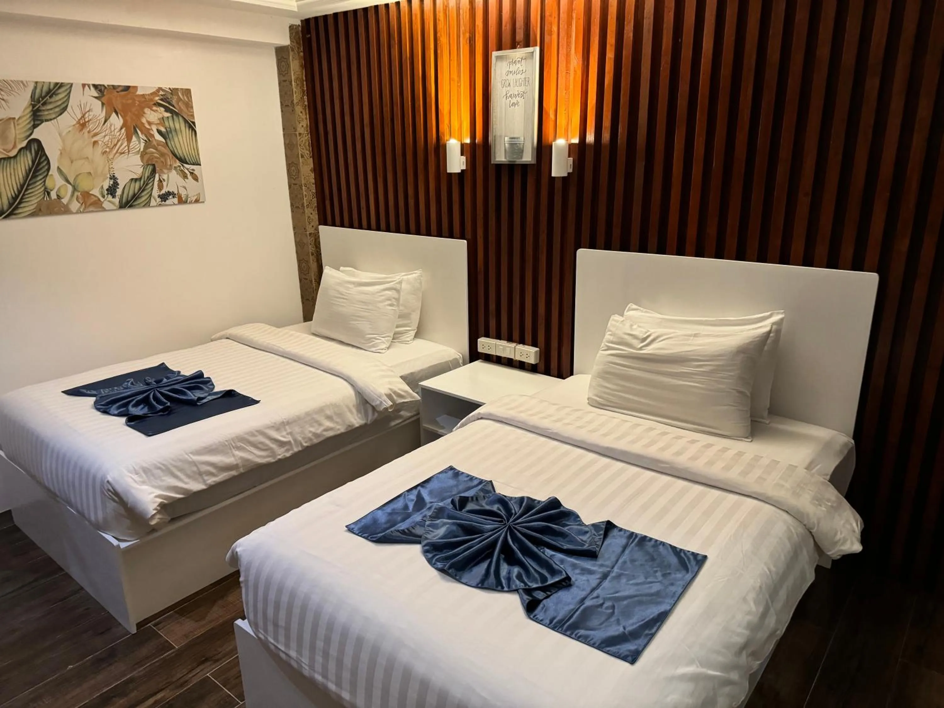 Bed in Bolabog Beach Resort