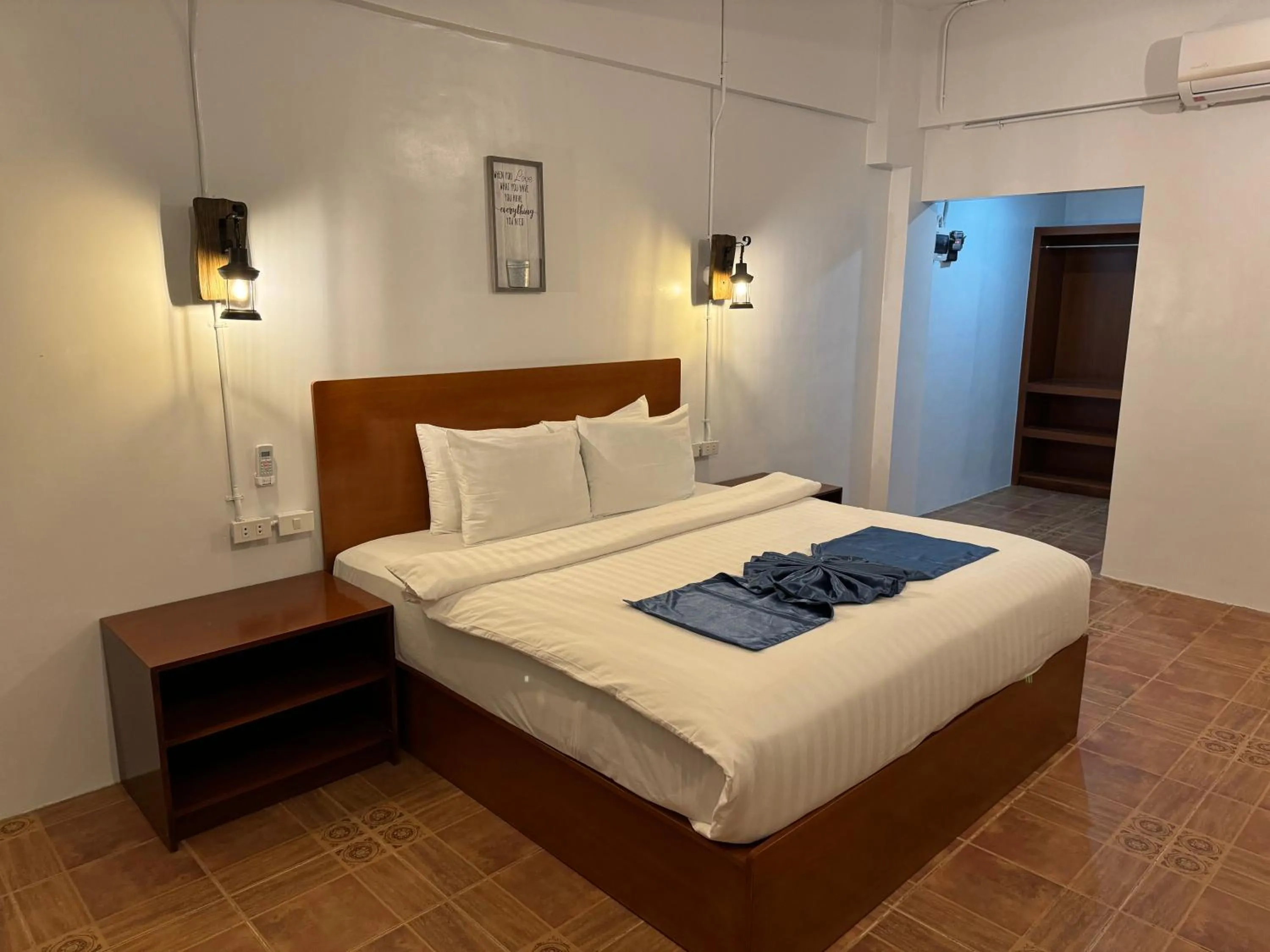 Bed in Bolabog Beach Resort