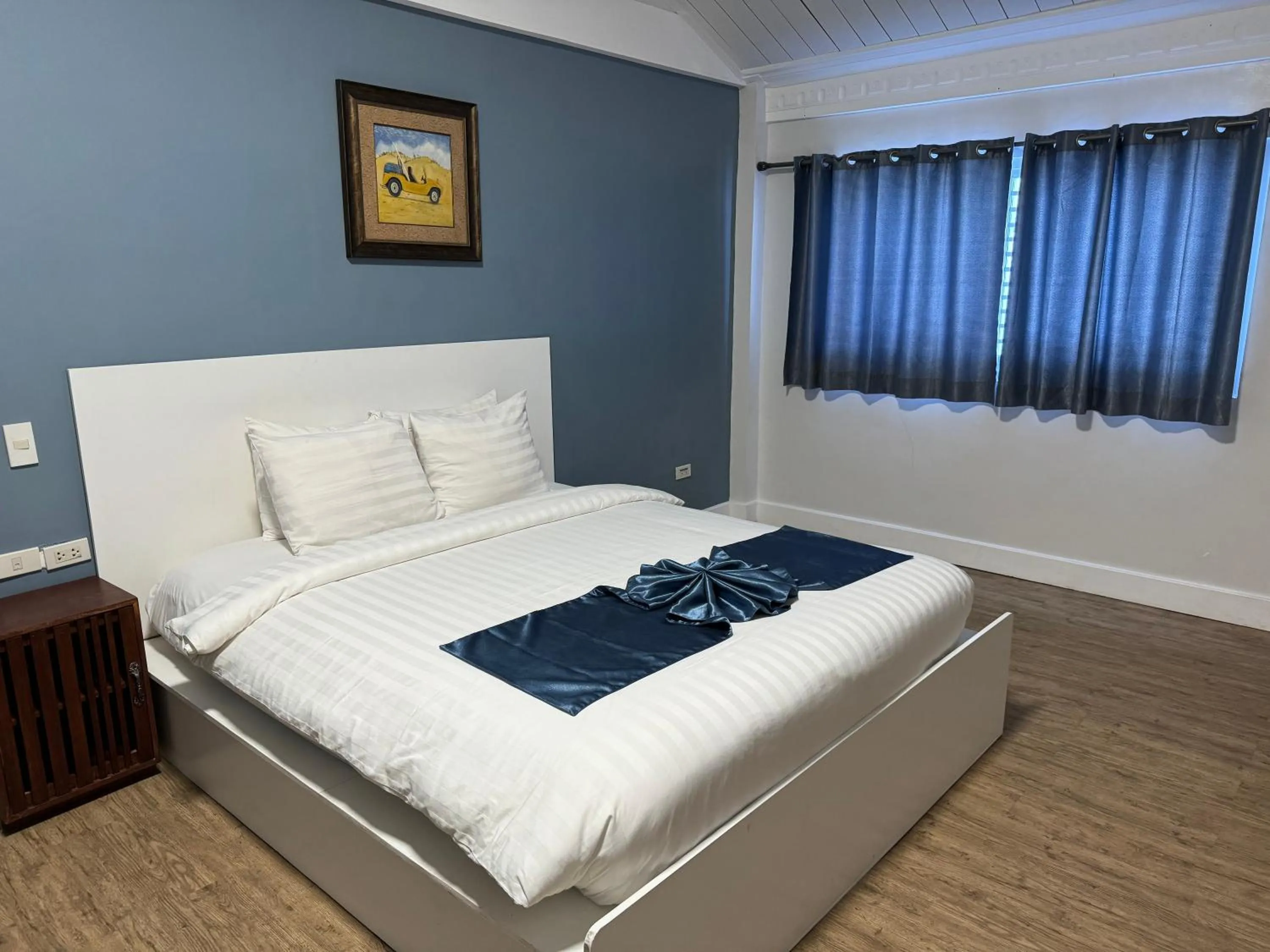 Bed in Bolabog Beach Resort