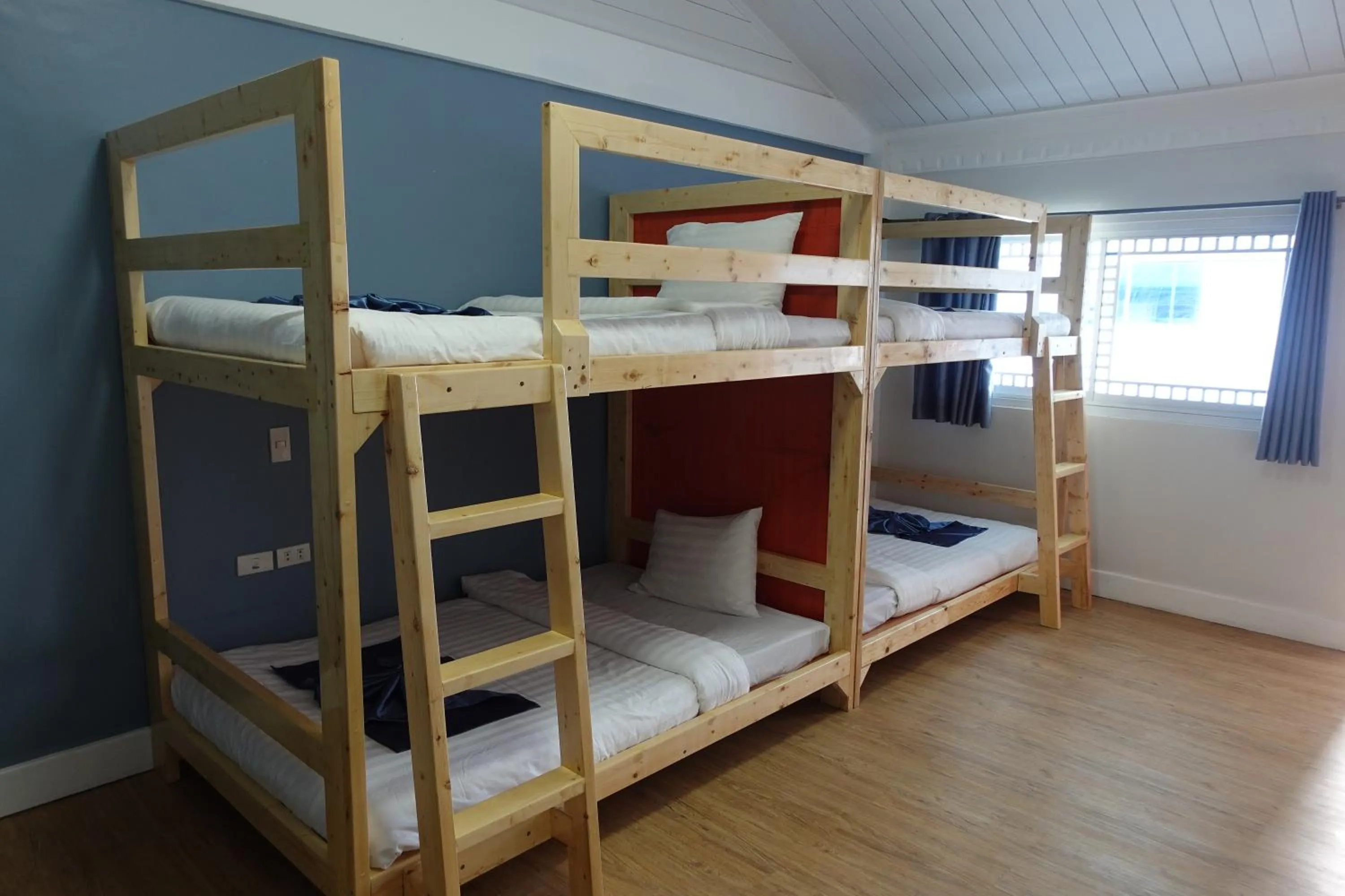 Bed in Bolabog Beach Resort