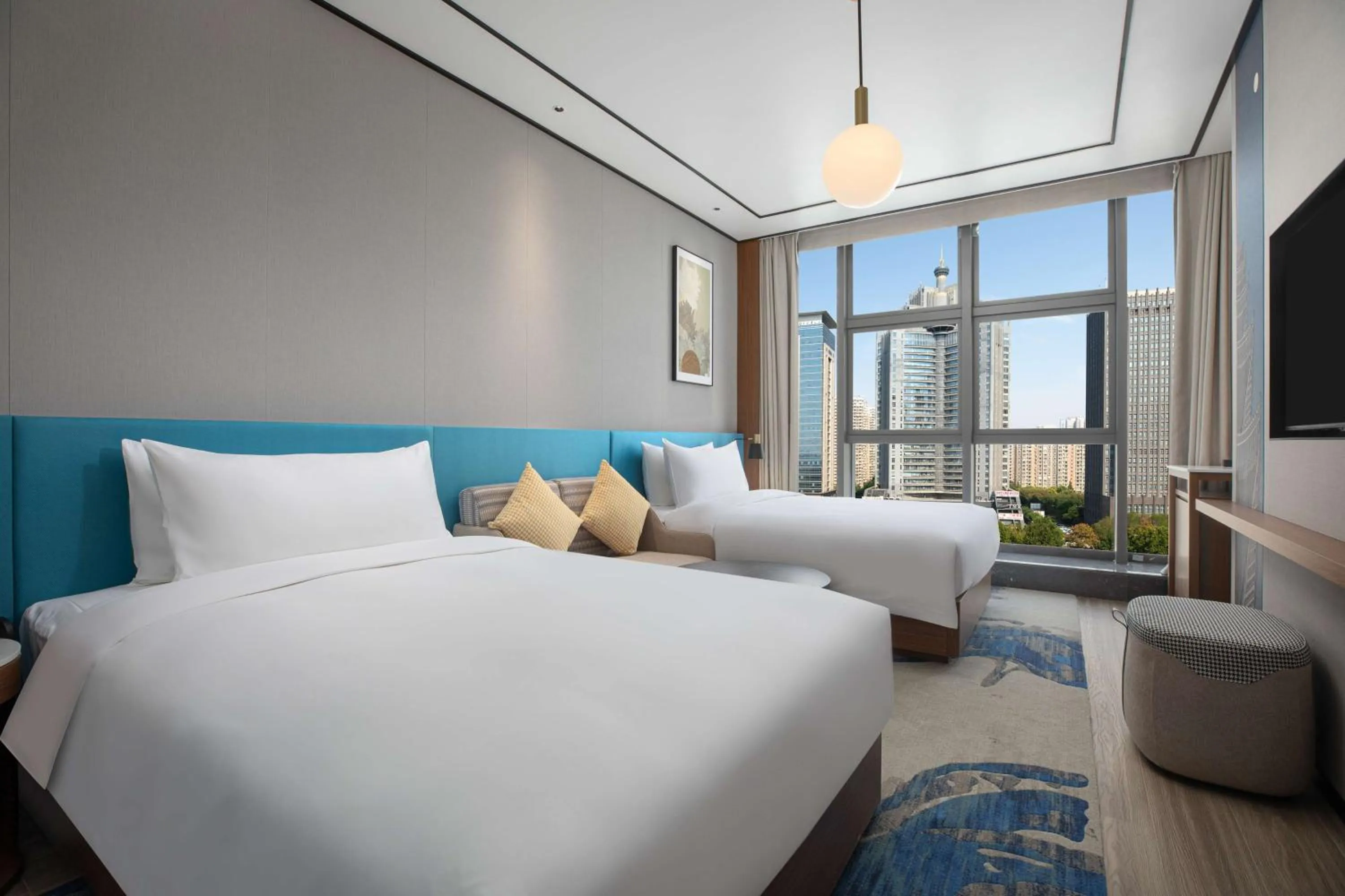 Bed in Hilton Garden Inn Luoyang Kaiyuan Avenue