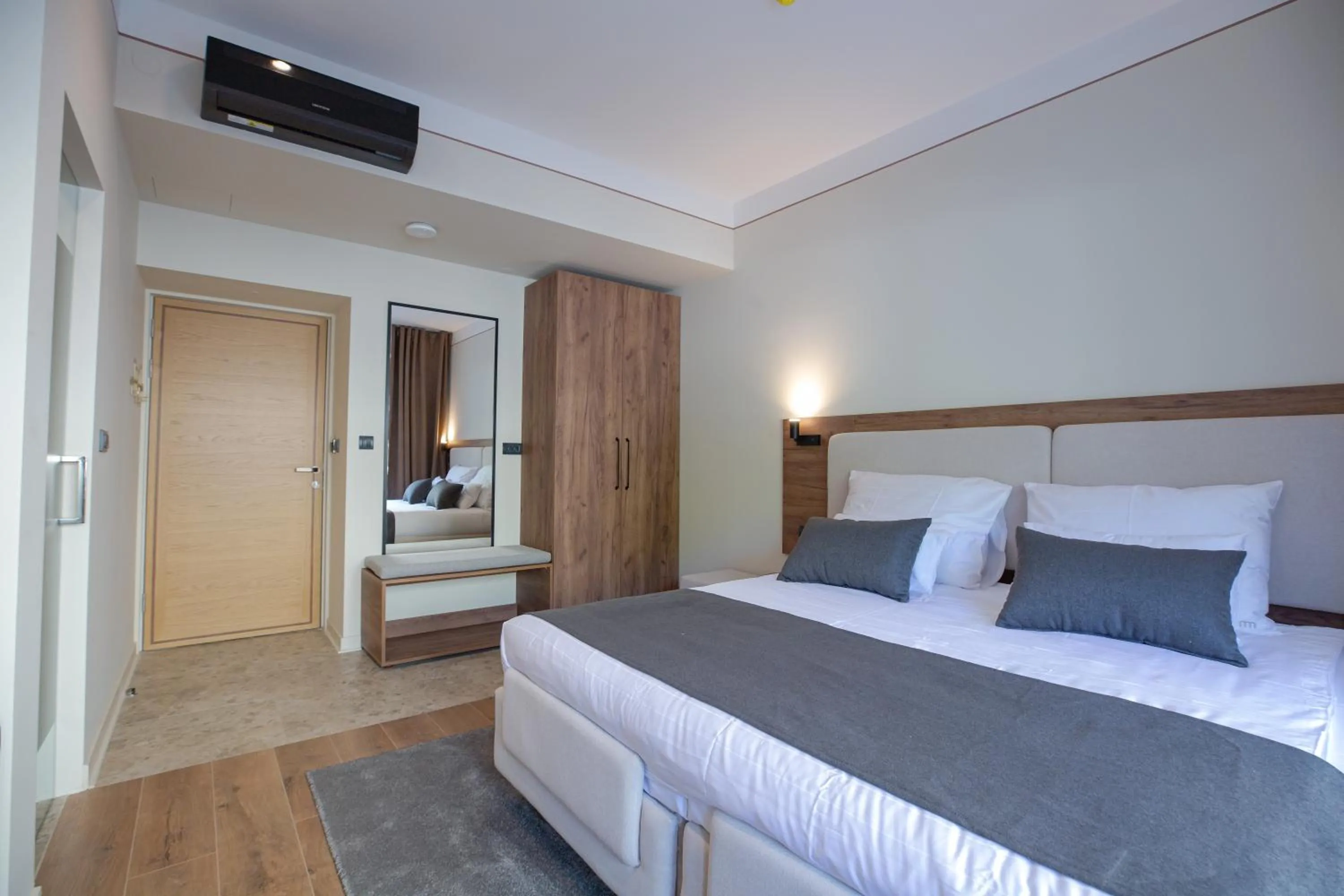 Bed in Simma Luxury Apartments & Rooms