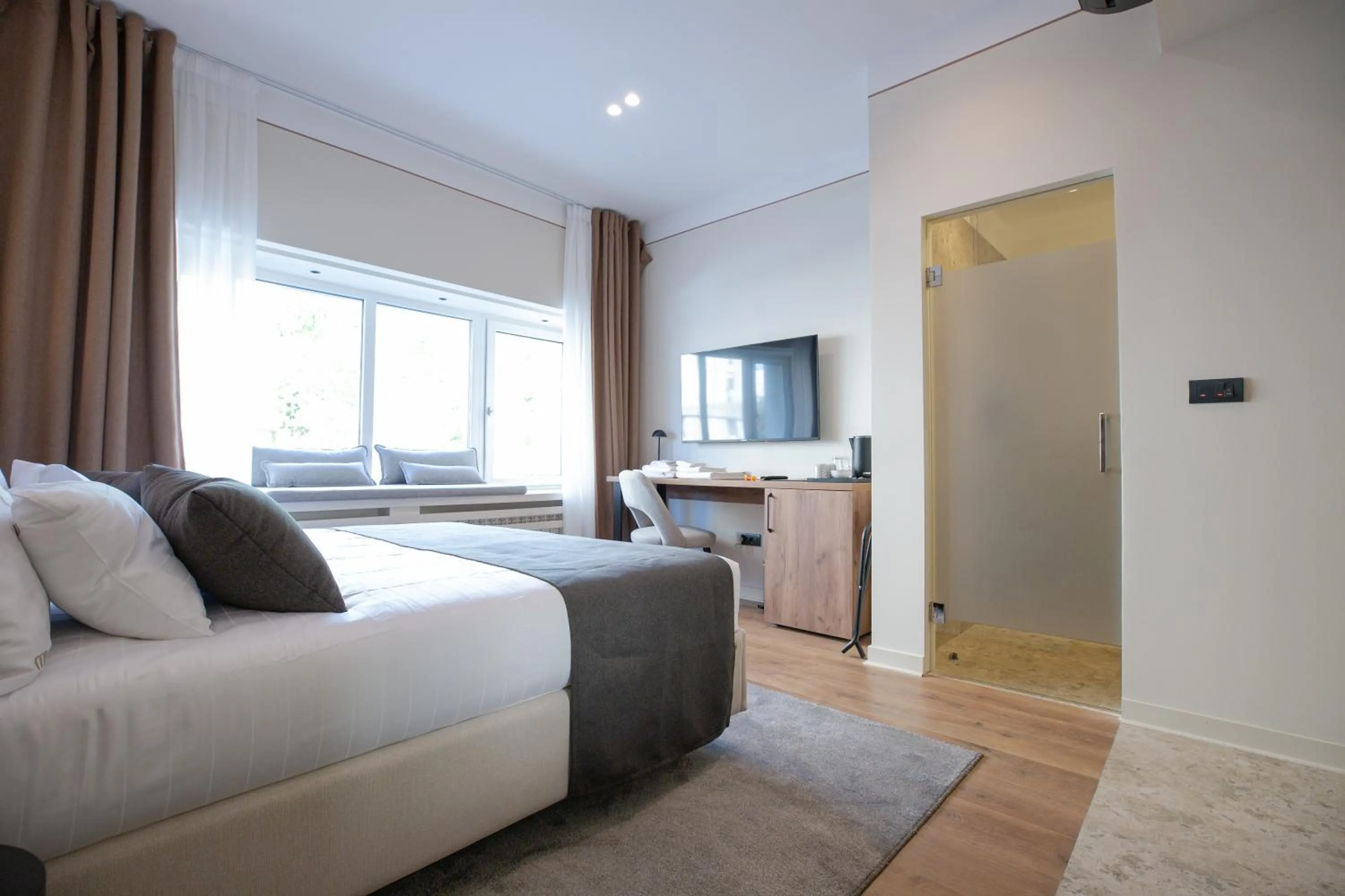 Bed in Simma Luxury Apartments & Rooms