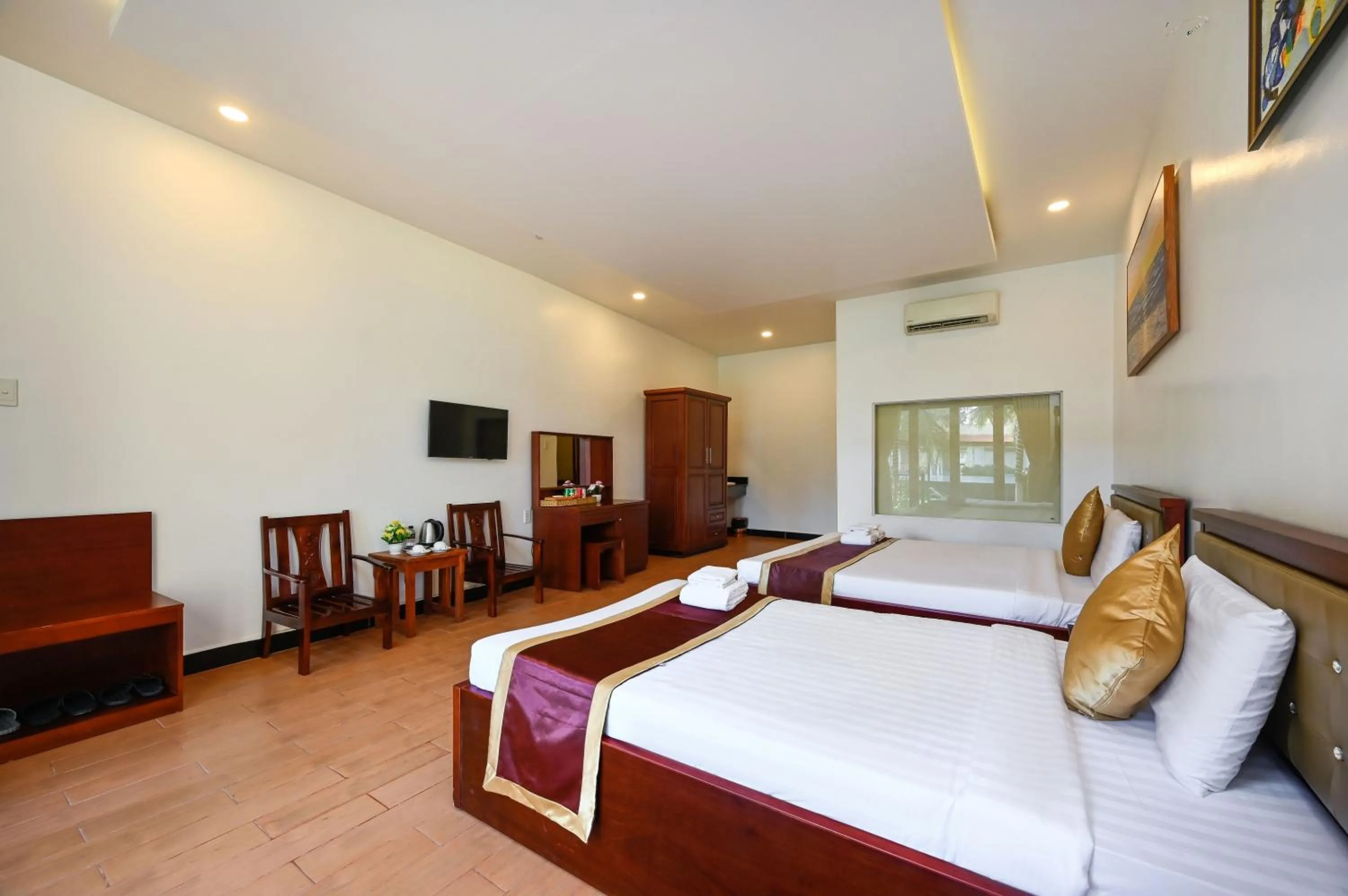 Living room, Bed in Ha Tien Xua Hotel & Resort