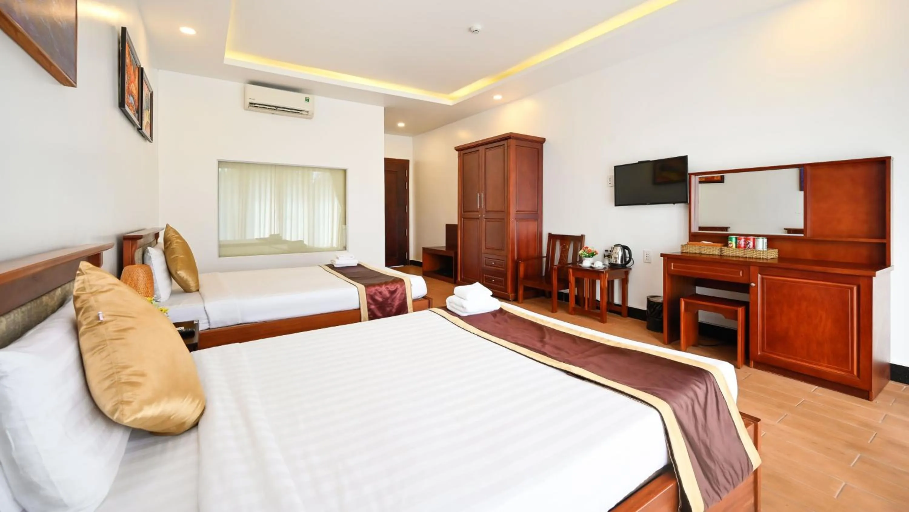 Communal lounge/ TV room, Bed in Ha Tien Xua Hotel & Resort