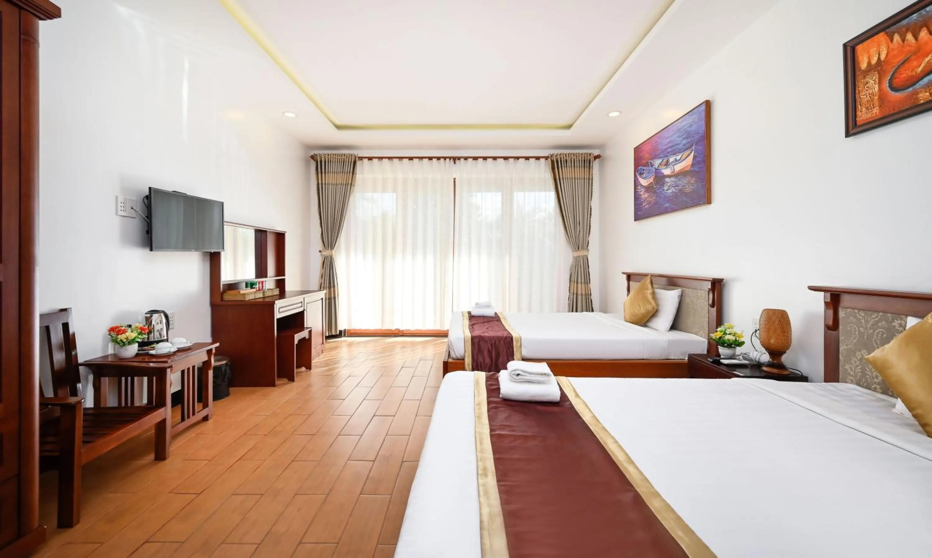 Communal lounge/ TV room, Bed in Ha Tien Xua Hotel & Resort