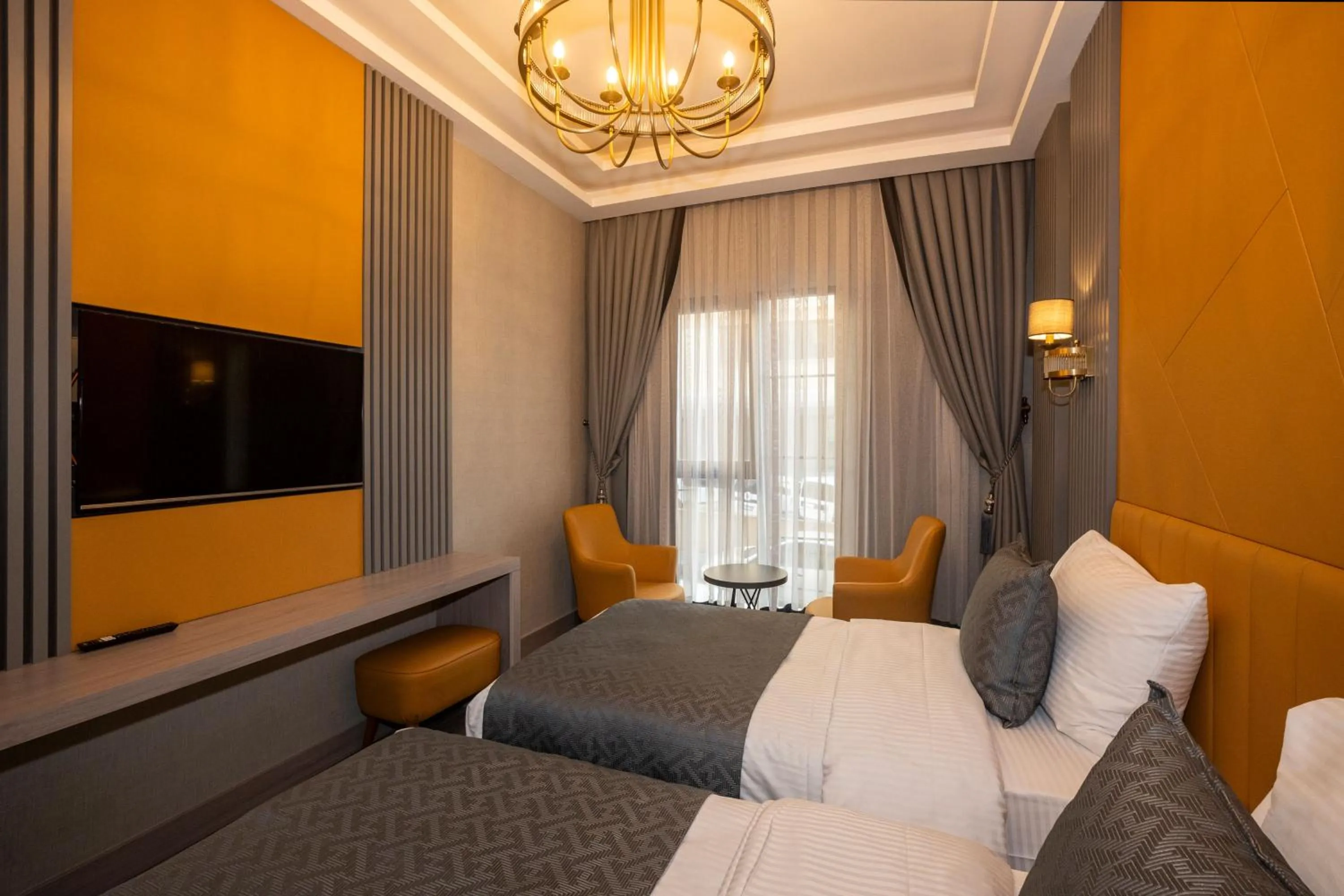 TV and multimedia, Bed in Icon Hotel Bomonti