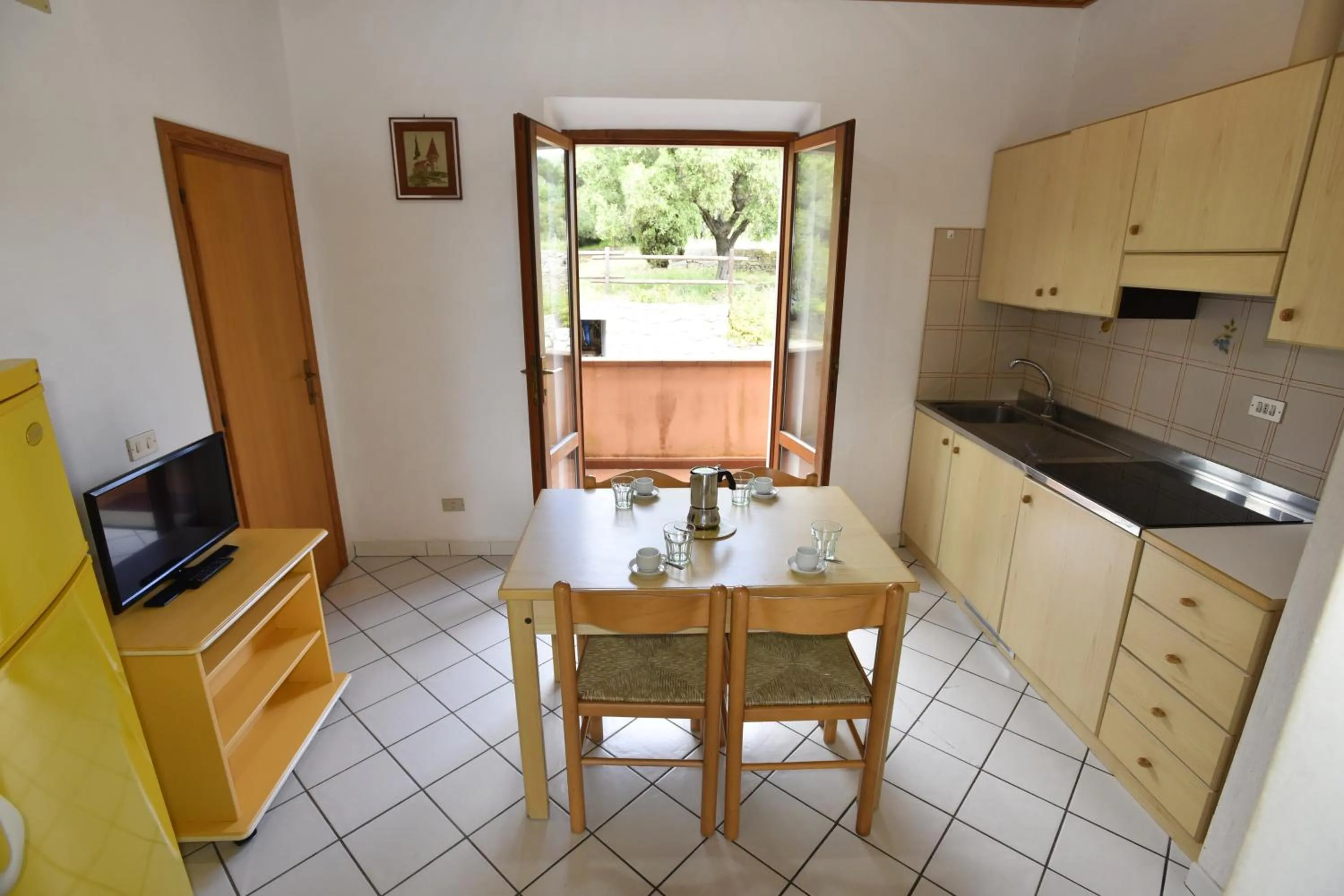 Kitchen or kitchenette in Casa Rosada - Piscina, aria condizionata, terrazze e posti auto