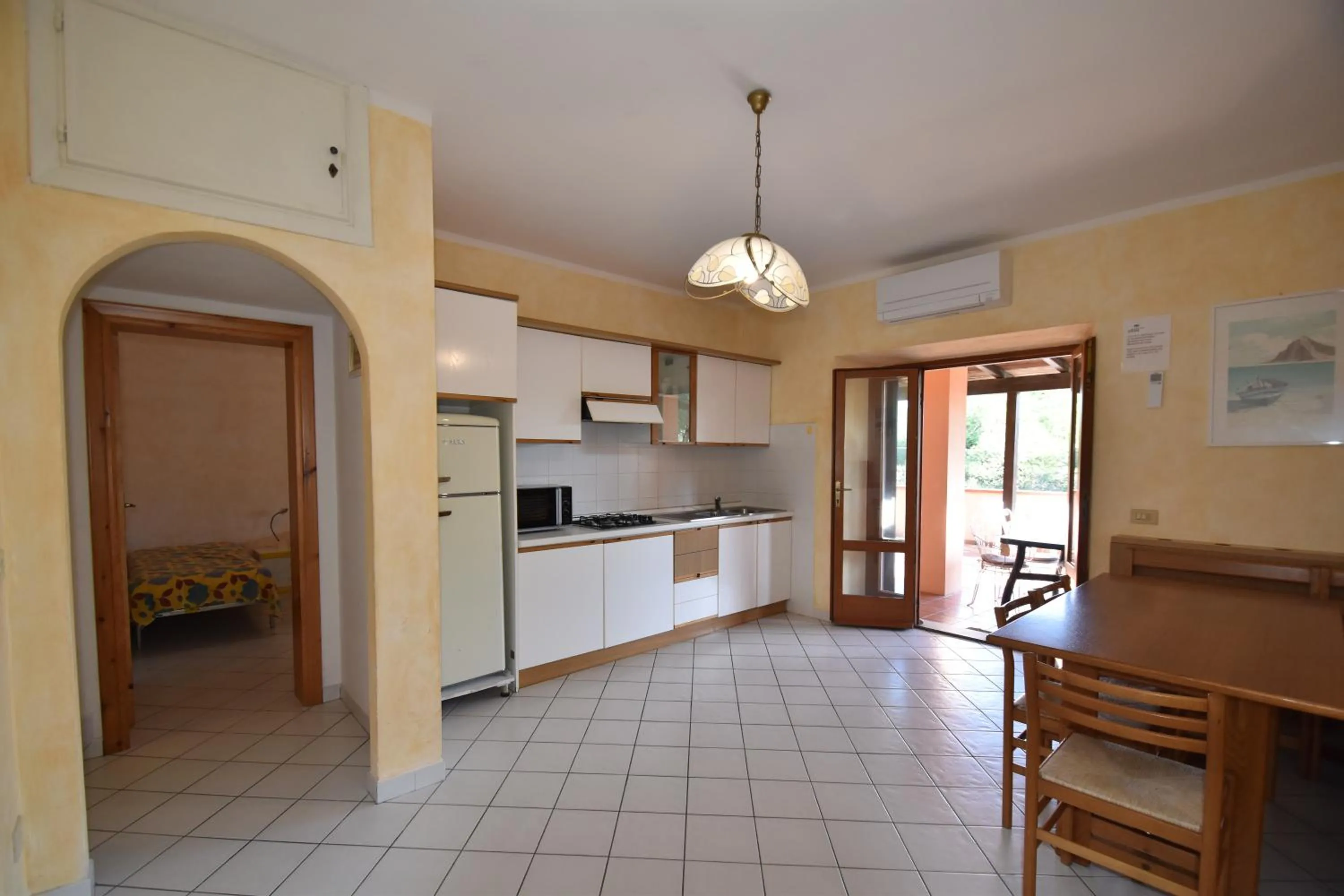 Kitchen or kitchenette in Casa Rosada - Piscina, aria condizionata, terrazze e posti auto
